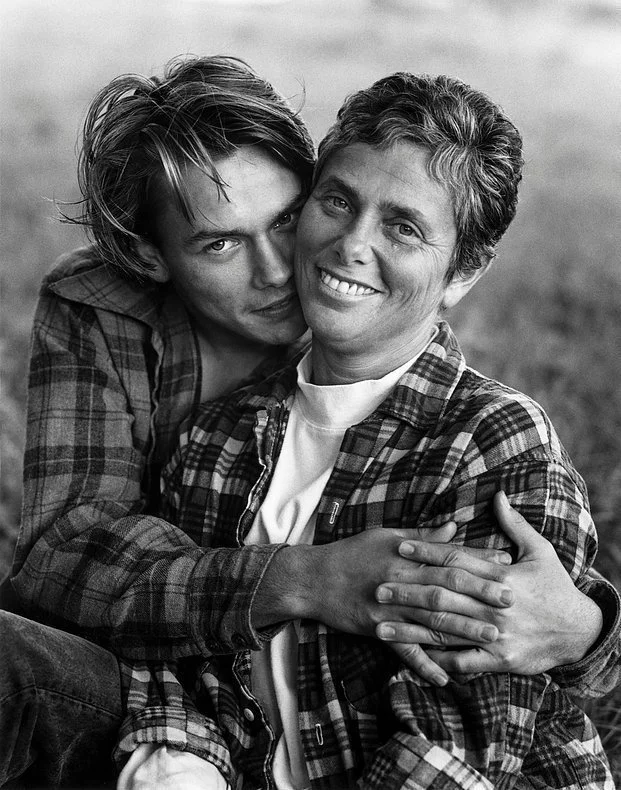 River Phoenix with his mother, Heart Phoenix, in a black and white portrait
