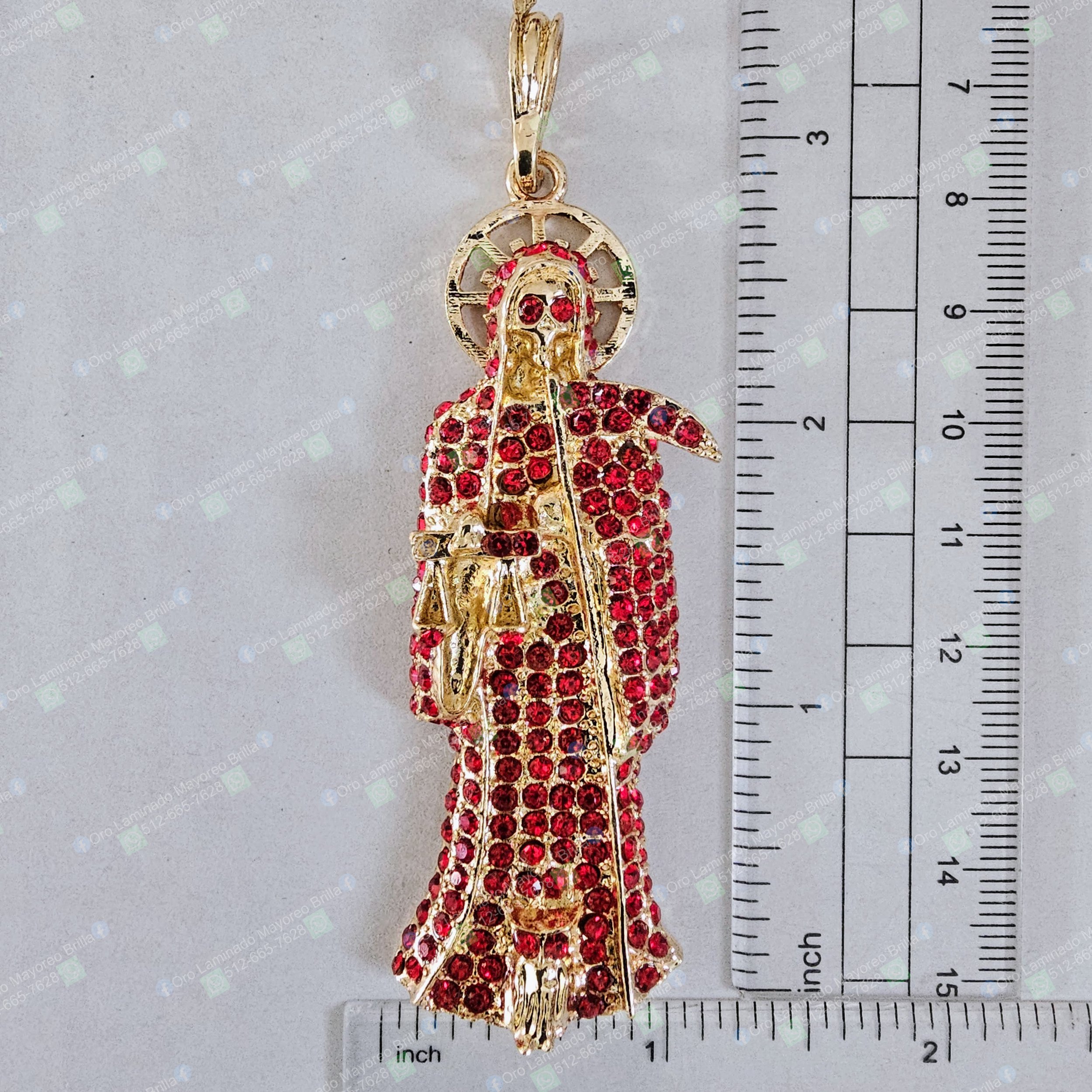Dije Santa Muerte con piedras rojas color oro | Santa Muerte pendant with red stones gold color