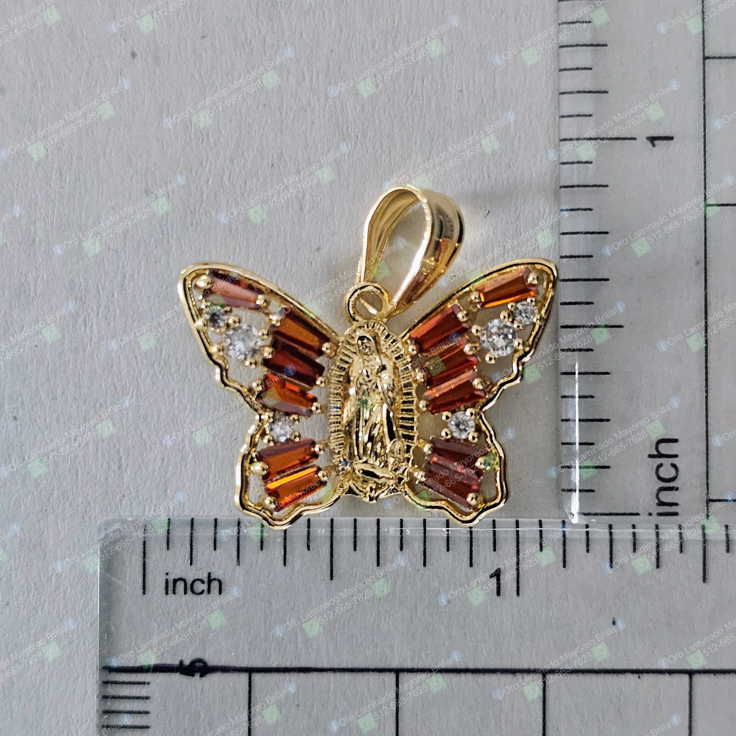 Dije mariposa Virgen de Guadalupe color oro con piedras ámbar | Gold color butterfly Virgin Mary pendant with amber stones