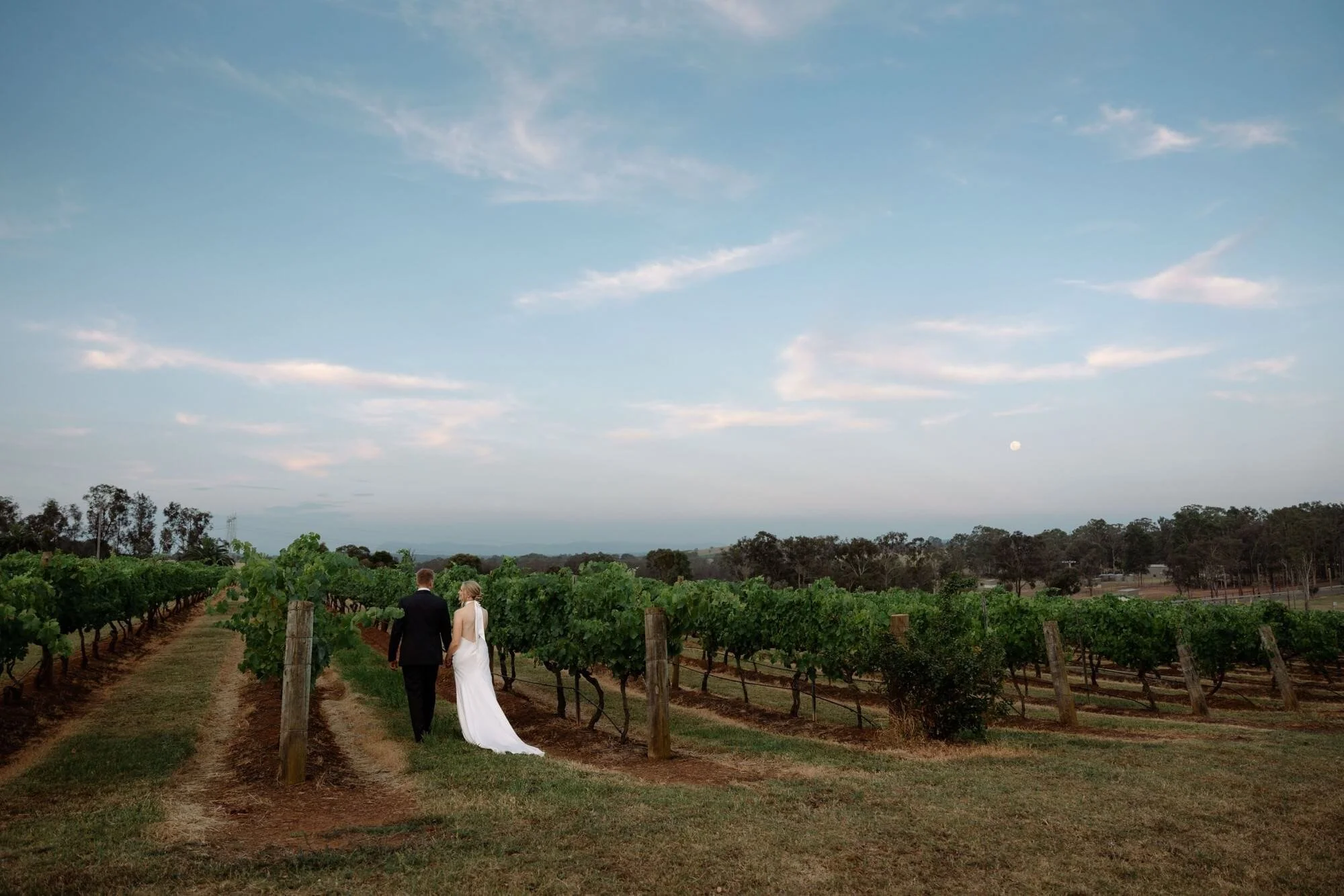 Couple in the vineyard at Bimbadgen Palmers Lane Hunter Valley