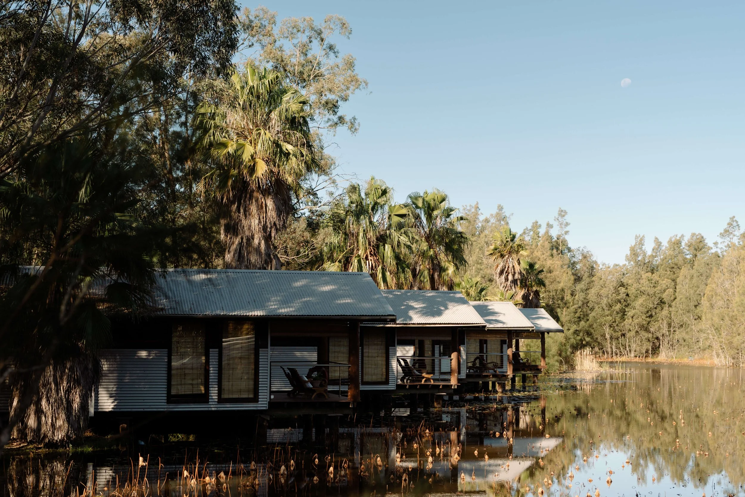 Bride getting ready in on-site villa at Leaves & Fishes