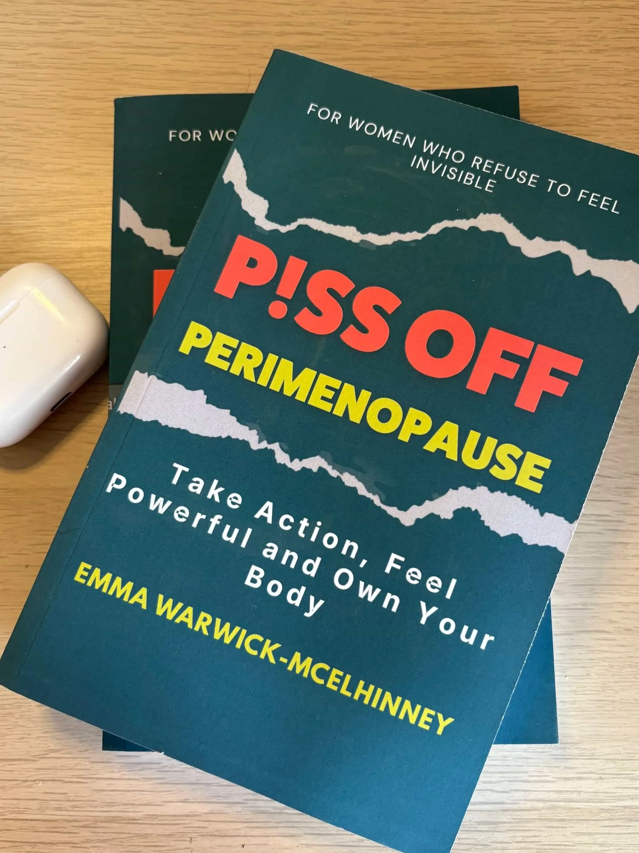 Books called Piss Off Perimenopause by Emma Warwick McElhinney