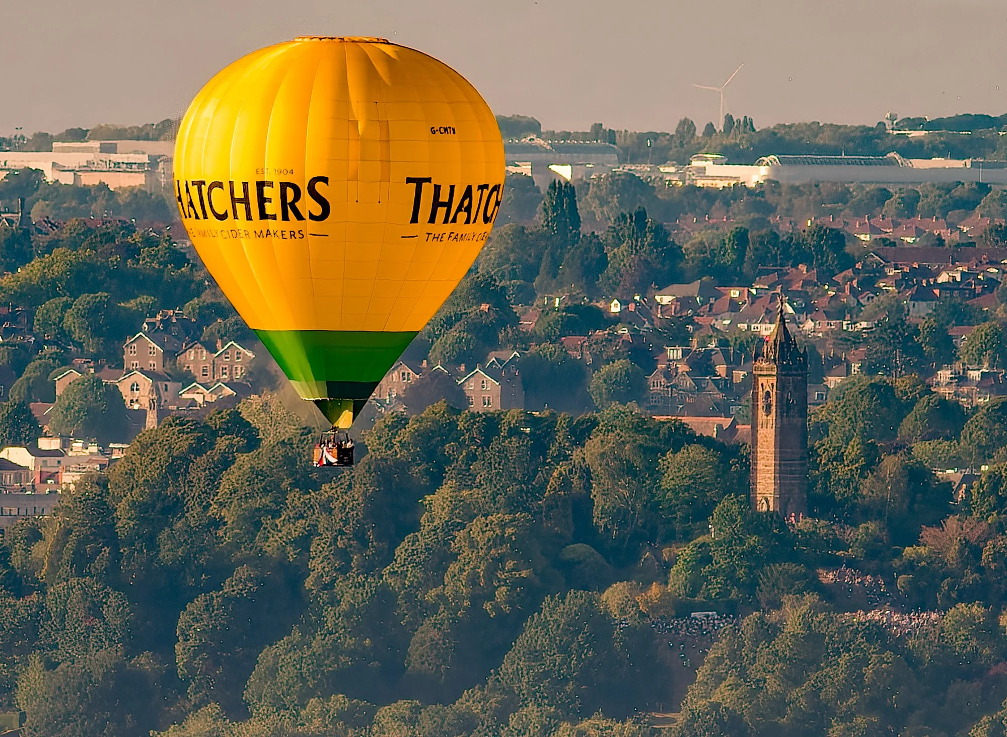 Balloon at Bristol Balloon Festival passing Cabot Tower on Brandon Hill on the evening of 10 August 2025