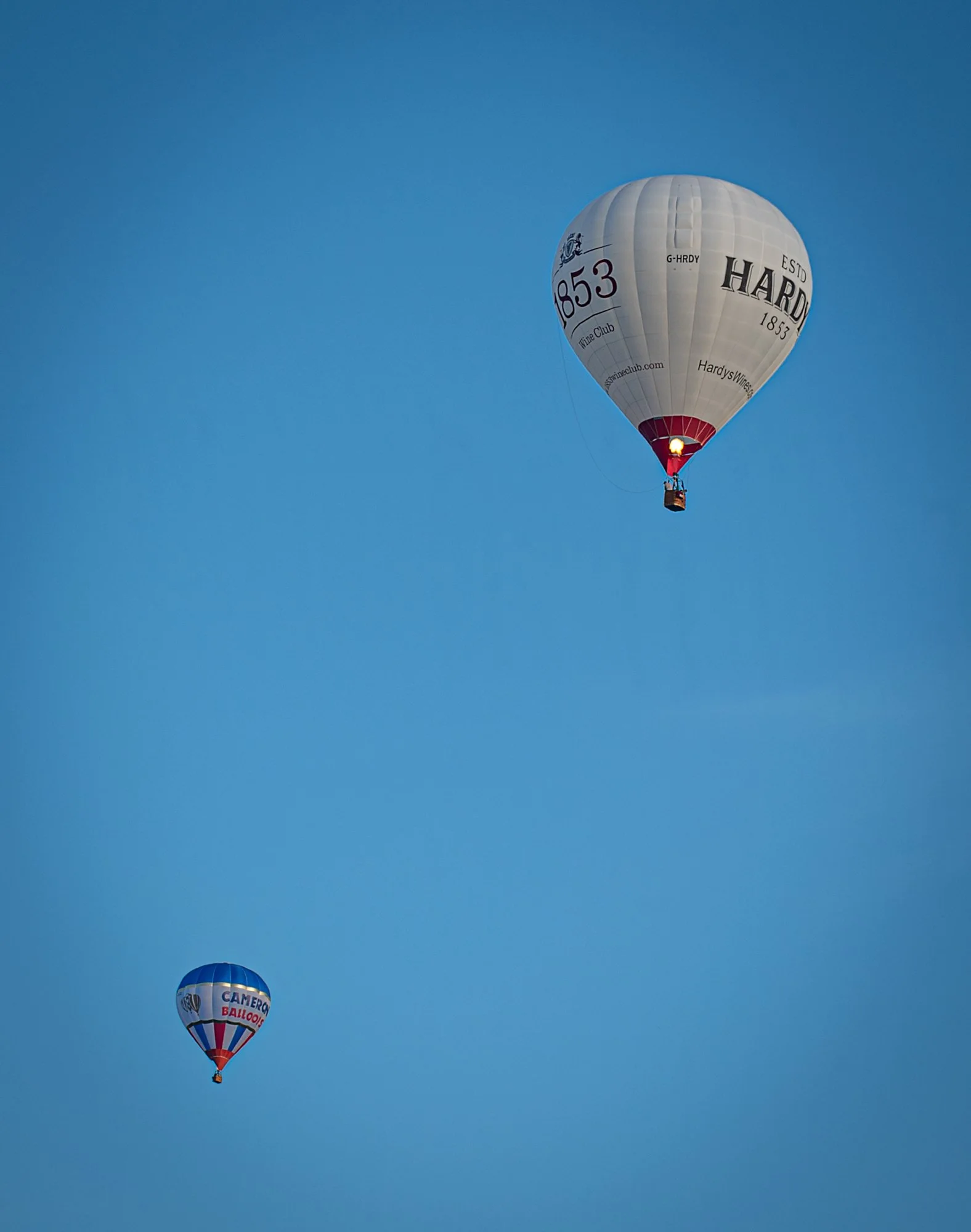 Balloons making their descent on the outskirts of Bristol at the Bristol Balloon Festival on the evening of Sunday 10 August 2025