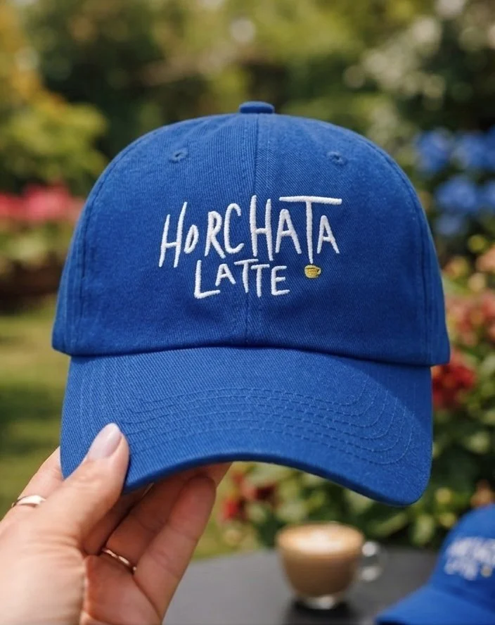 Side view of blue embroidered dad hat from 787 Coffee, unisex Latino coffee culture cap
