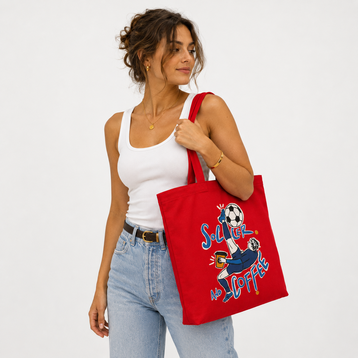 787 Coffee Soccer & Coffee tote folded flat showing the structured base — limited-edition red fútbol canvas tote bag