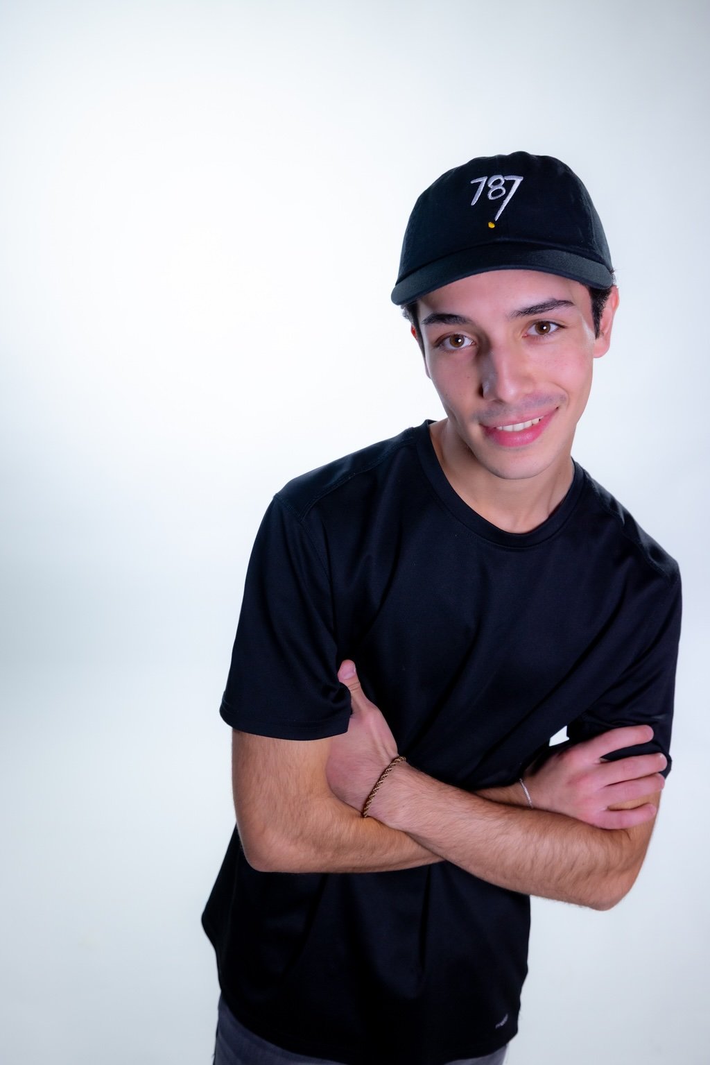 Man wearing 787 hat black cotton