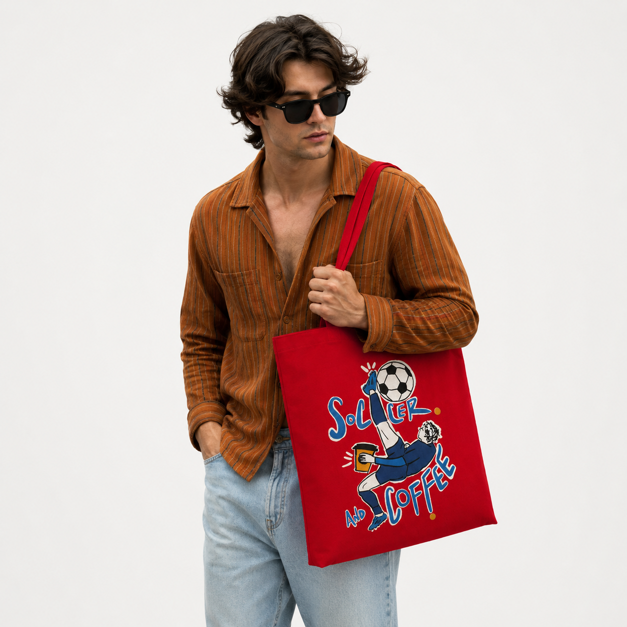 Side profile of the 787 Coffee Soccer & Coffee fútbol tote bag — durable red canvas with boxed gusset base