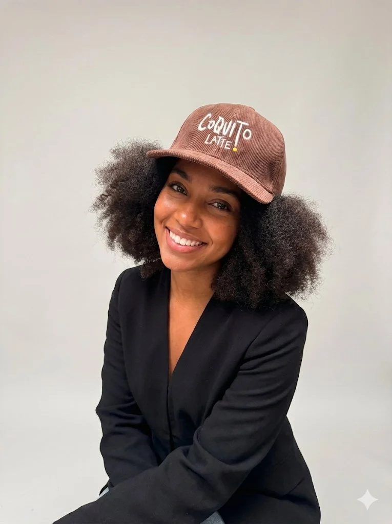 Puerto rican girl with coquito latte hat sold at 787 coffeee best coffee coquito