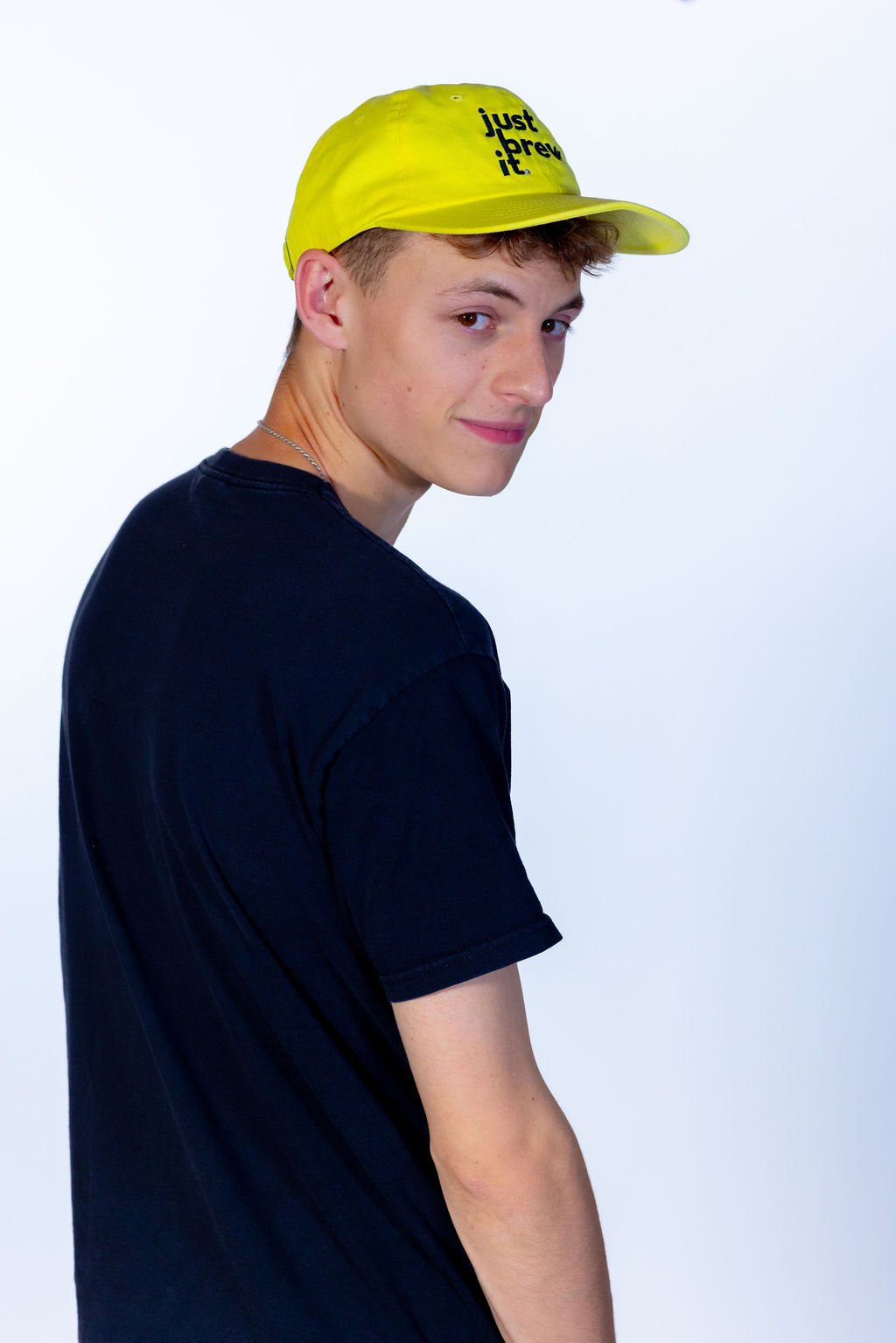 Just Brew it Hat male wearing the hat, white background by 787 coffee