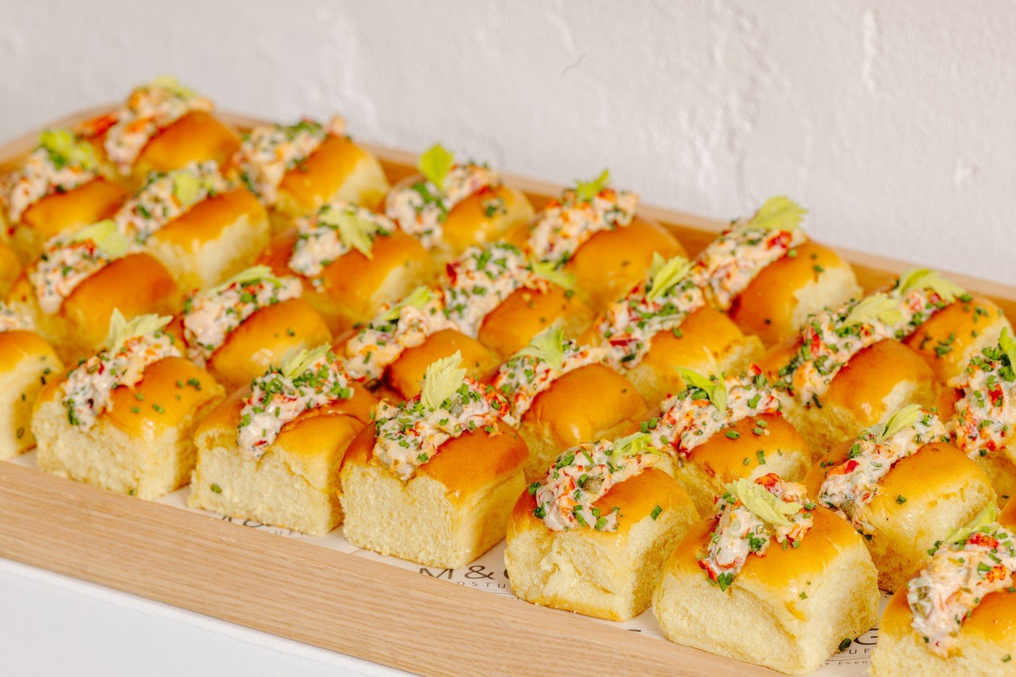 Up close and personal with our lobster roll. A crowd favorite on our canap&eacute; menu and designed to impress at any event 🧡