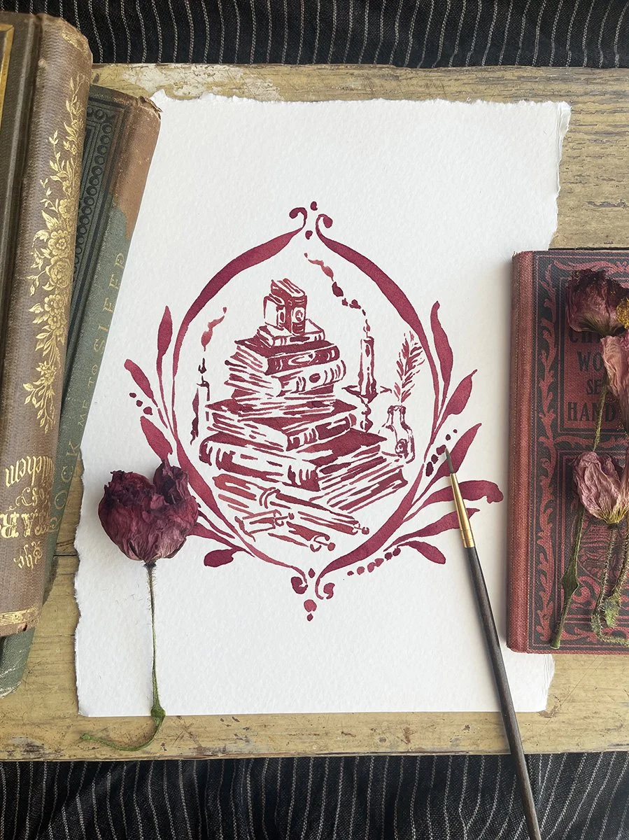 Watercolor painting of a stack of old books by Phoebe Stout for Talufane