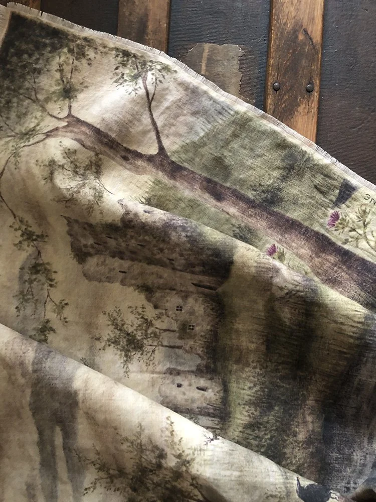 detail of linen wall panel with old castle ruins by Talufane