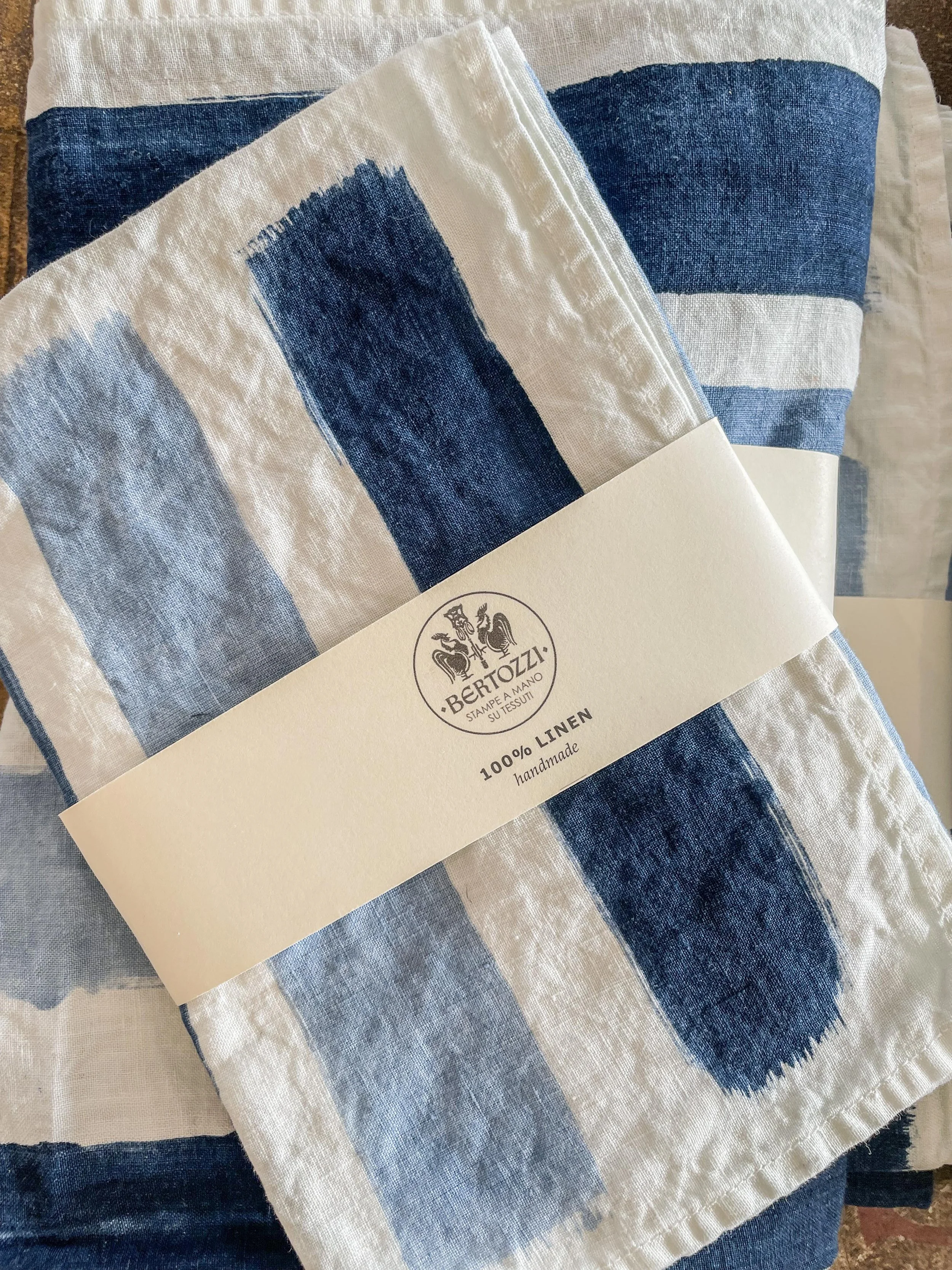 Stamperia Bertozzi is a family-run Italian atelier known for hand-printing linens using traditional woodblock techniques. Each piece is crafted in Emilia-Romagna, blending centuries-old methods with refined, modern design.