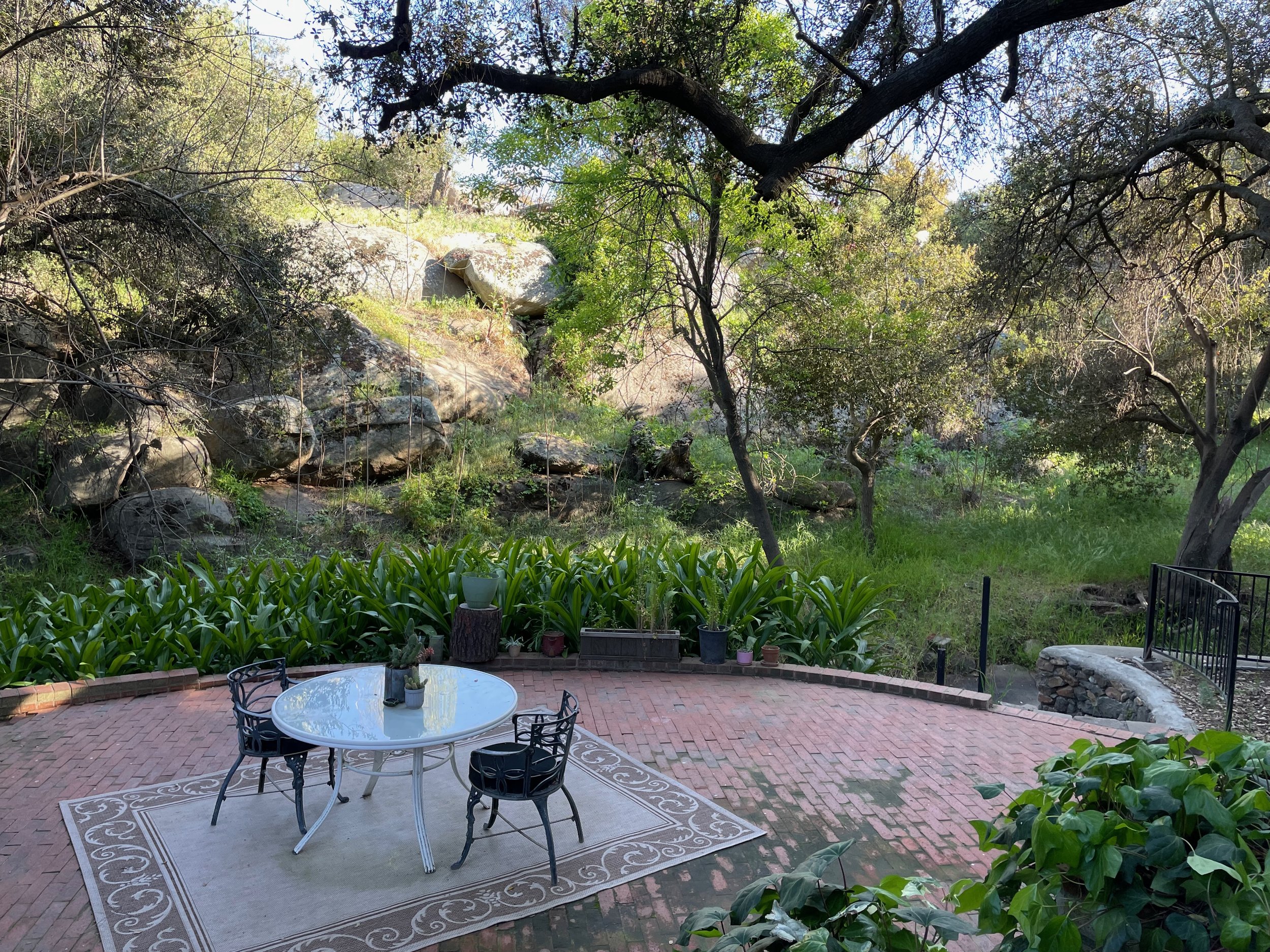 Creekside Patio Area with steps down to the creek