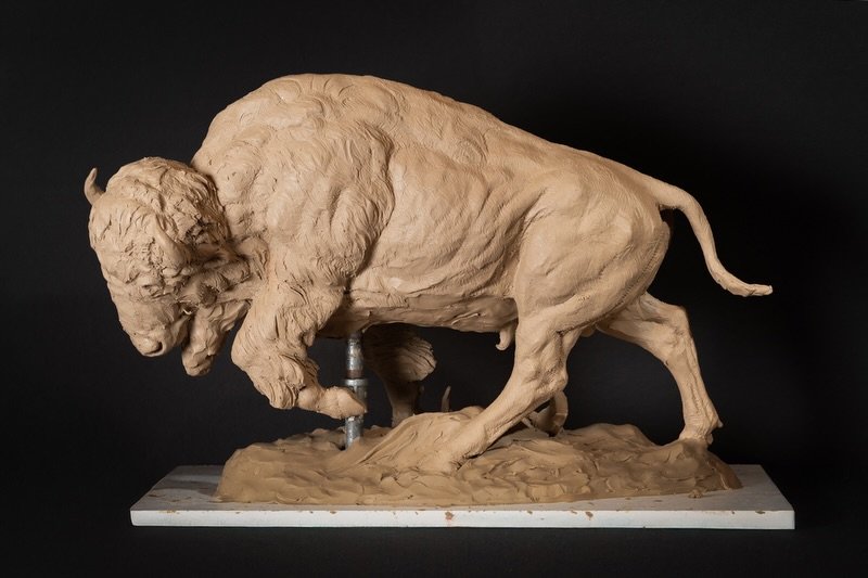 Facing the Storm by Vic Payne⁠
A dynamic wildlife sculpture that powerfully captures the essence of the American bison, a symbol deeply rooted in the heritage of Native American cultures, especially among the Plains tribes. The American bison stands 