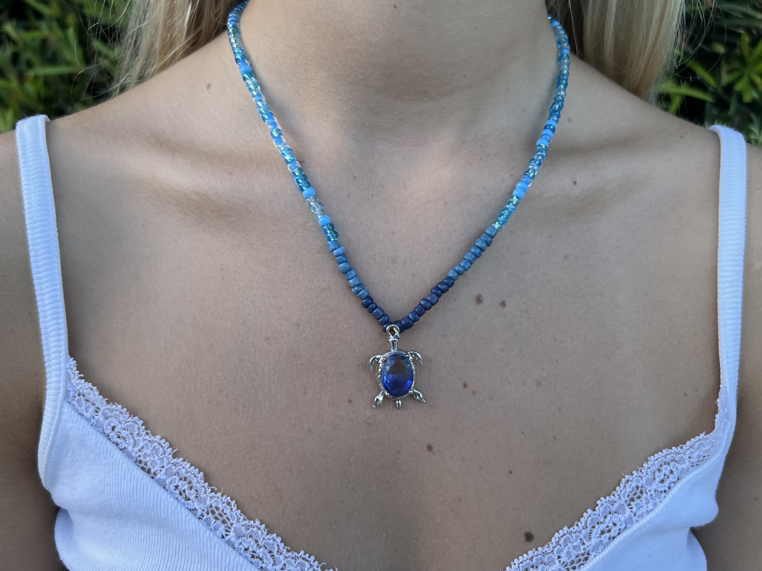 Blue Beaded Necklace With Turtle Charm