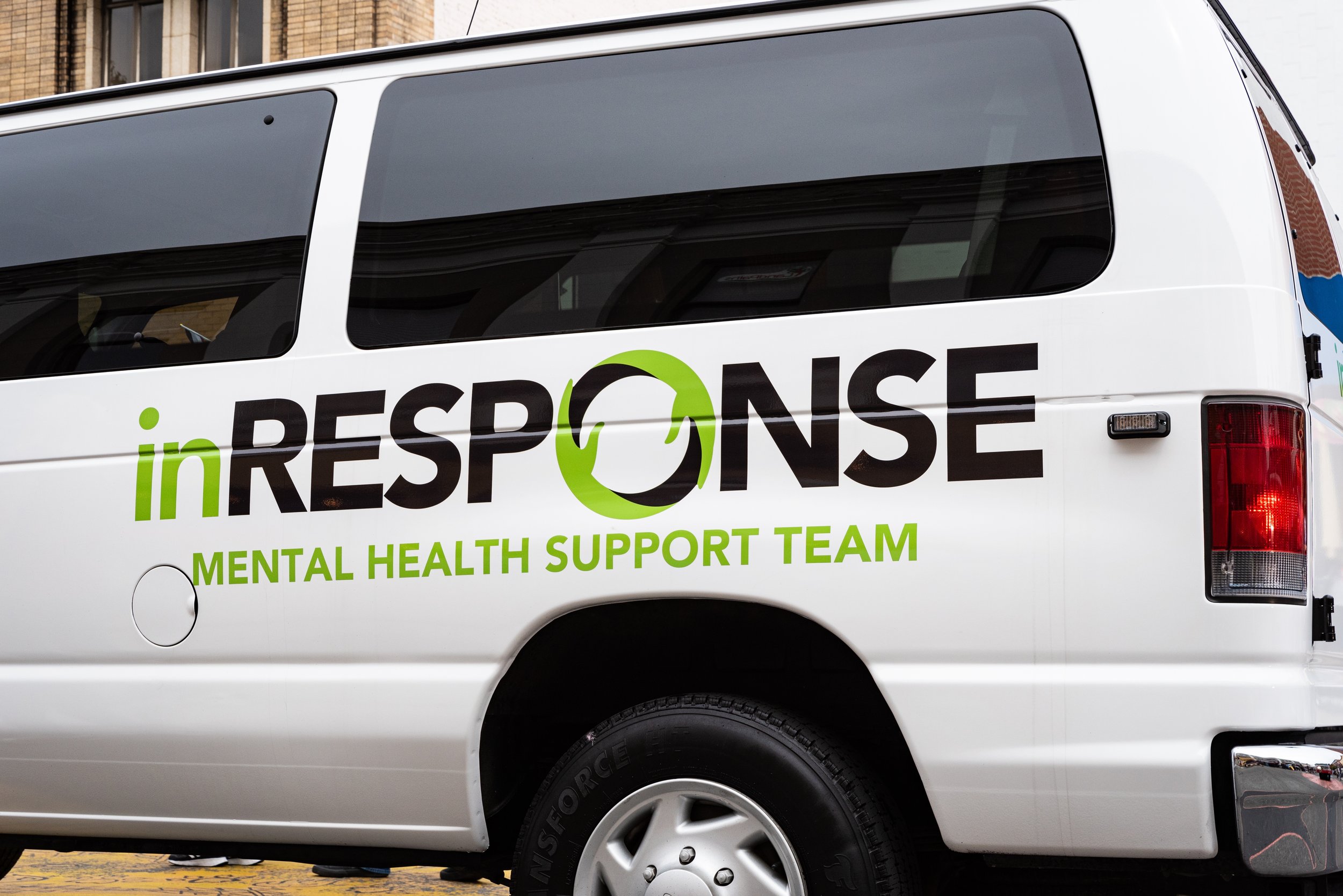White van with text "inRESPONSE Mental Health Support Team" written on the side