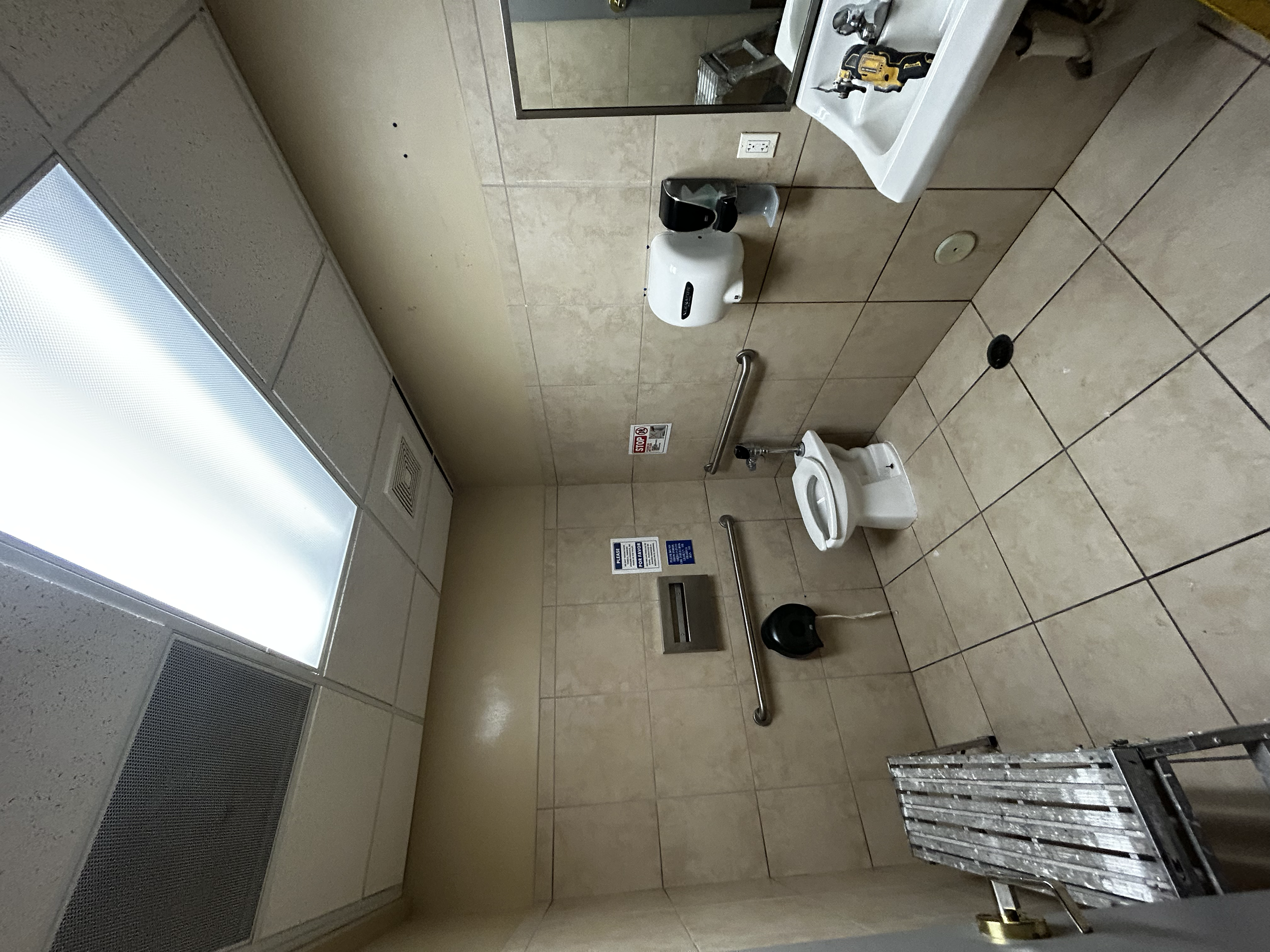 Before remodel in ADA bathroom at Miami Lakes Athletic Club