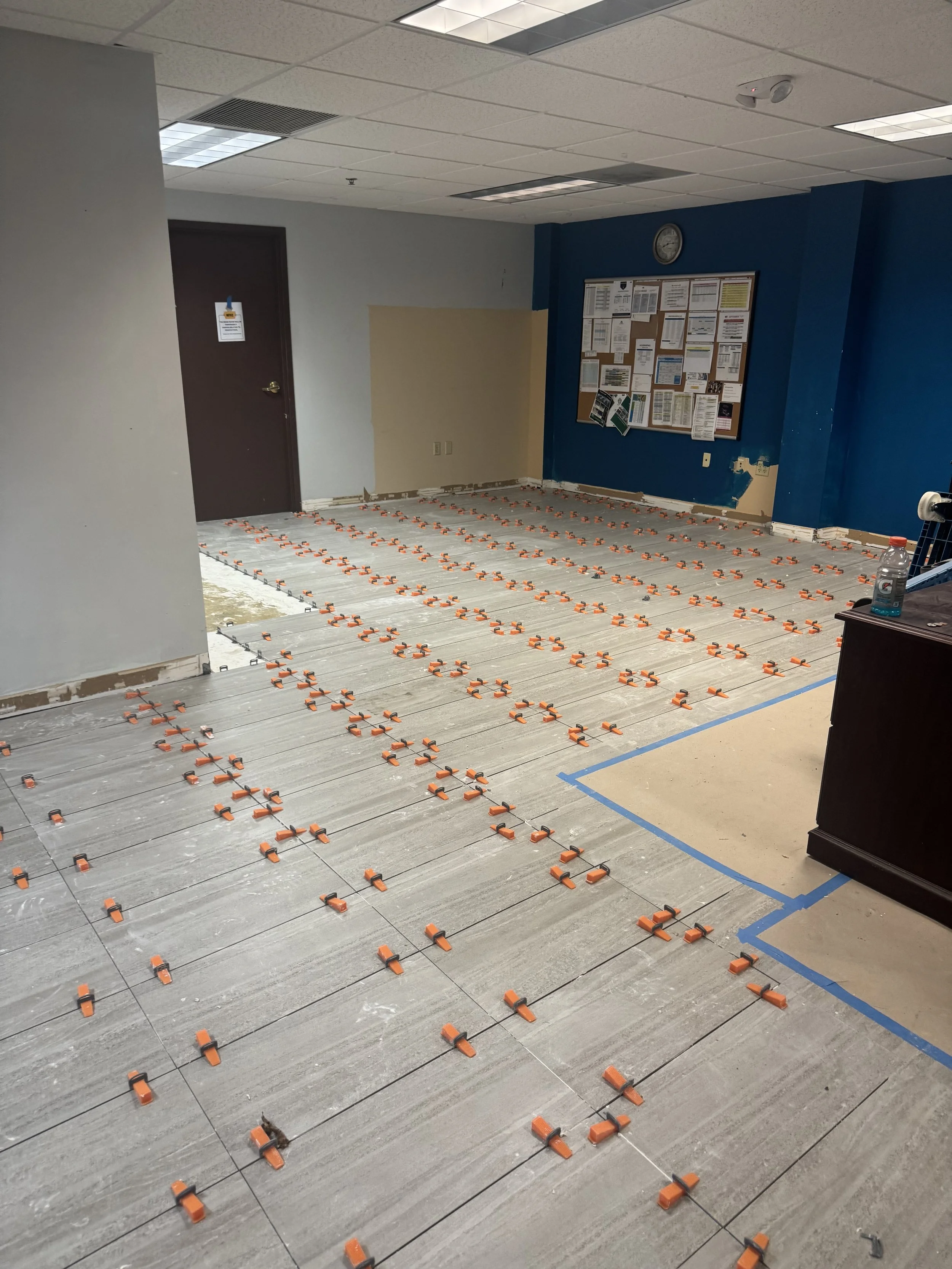 New flooring in progress at Miami Lakes Athletic Club office area