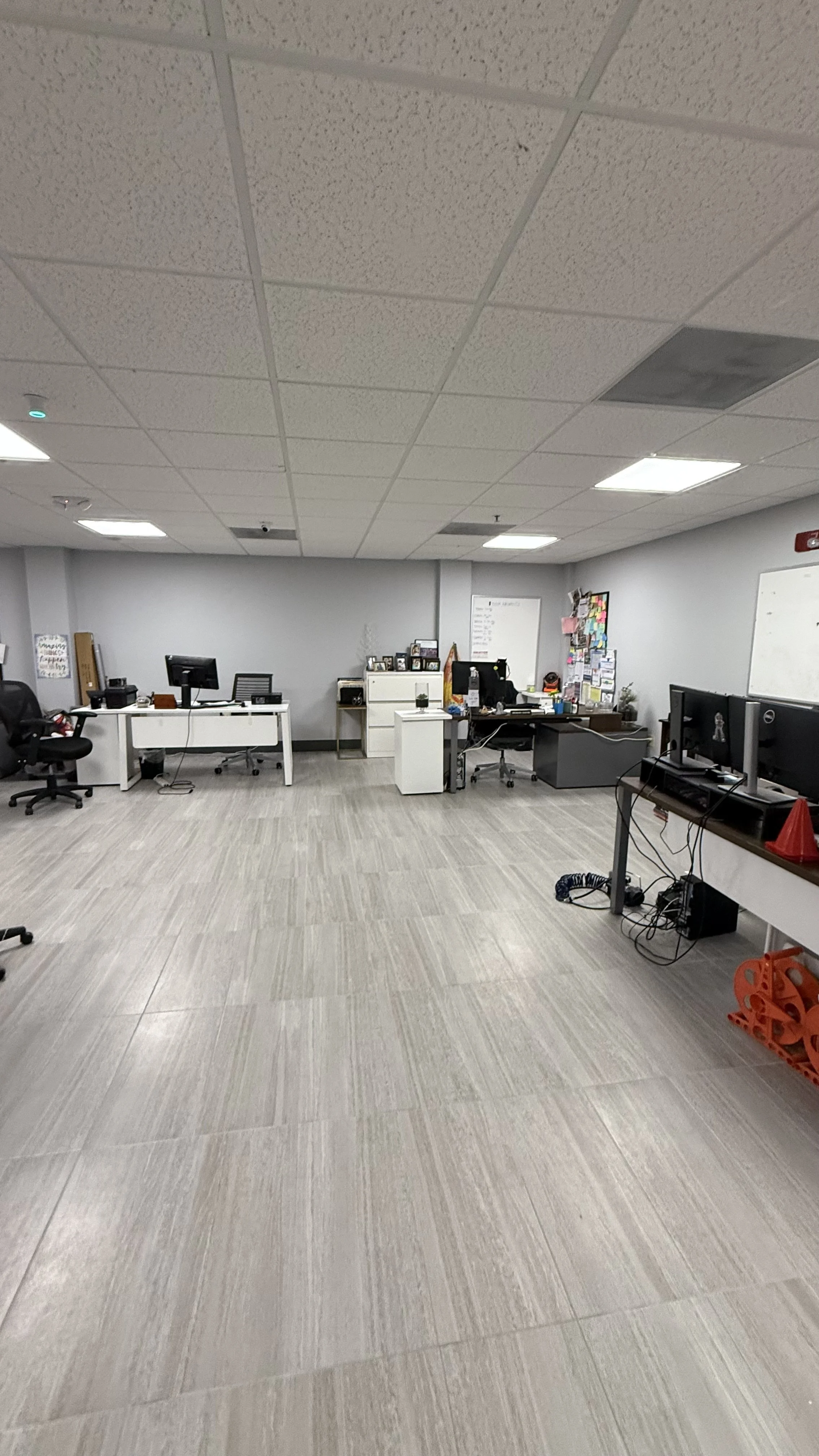 New flooring, baseboards, light panels, and paint in Miami Lakes Athletic Club