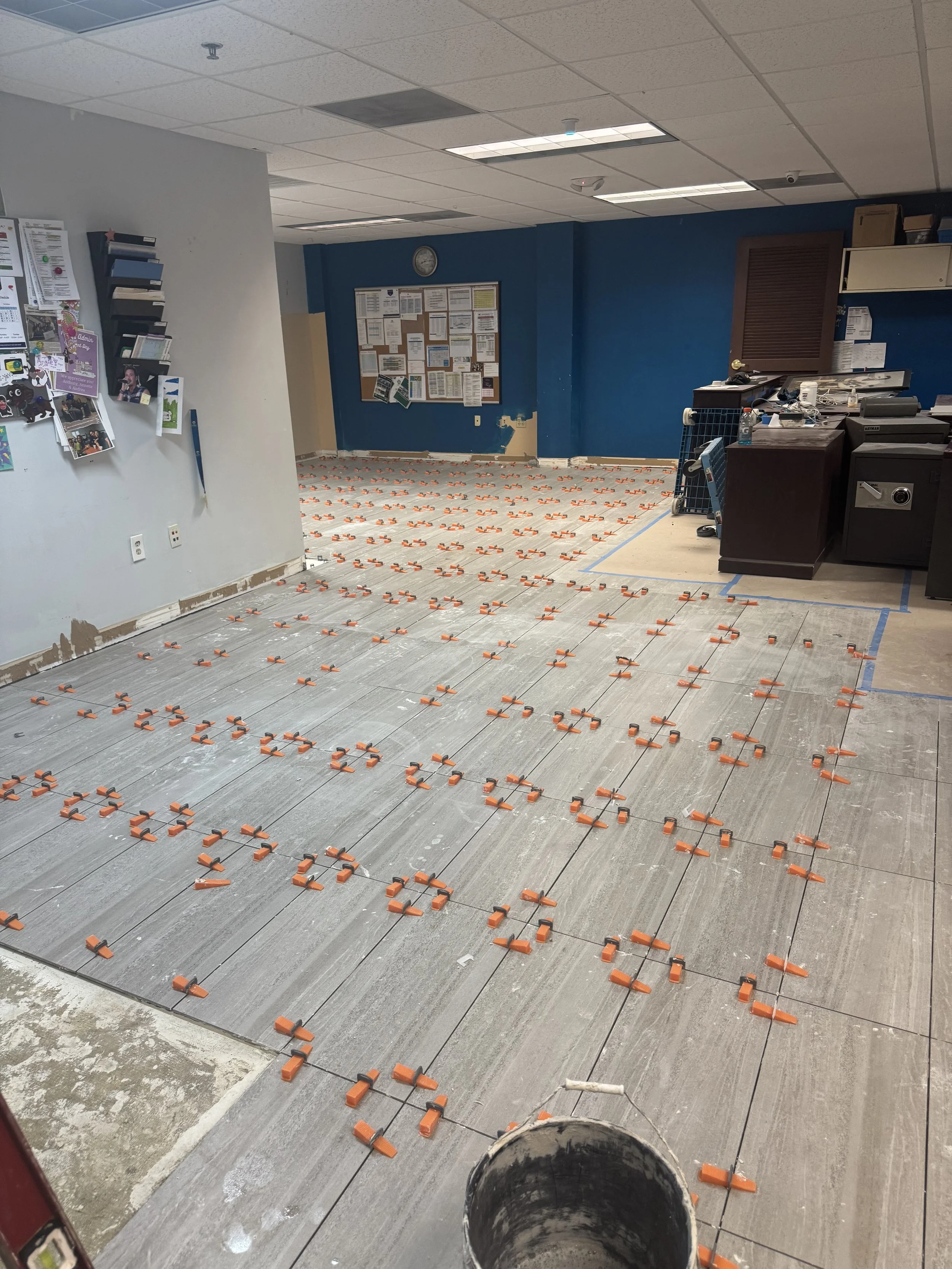 New flooring in progress at Miami Lakes Athletic Club office area