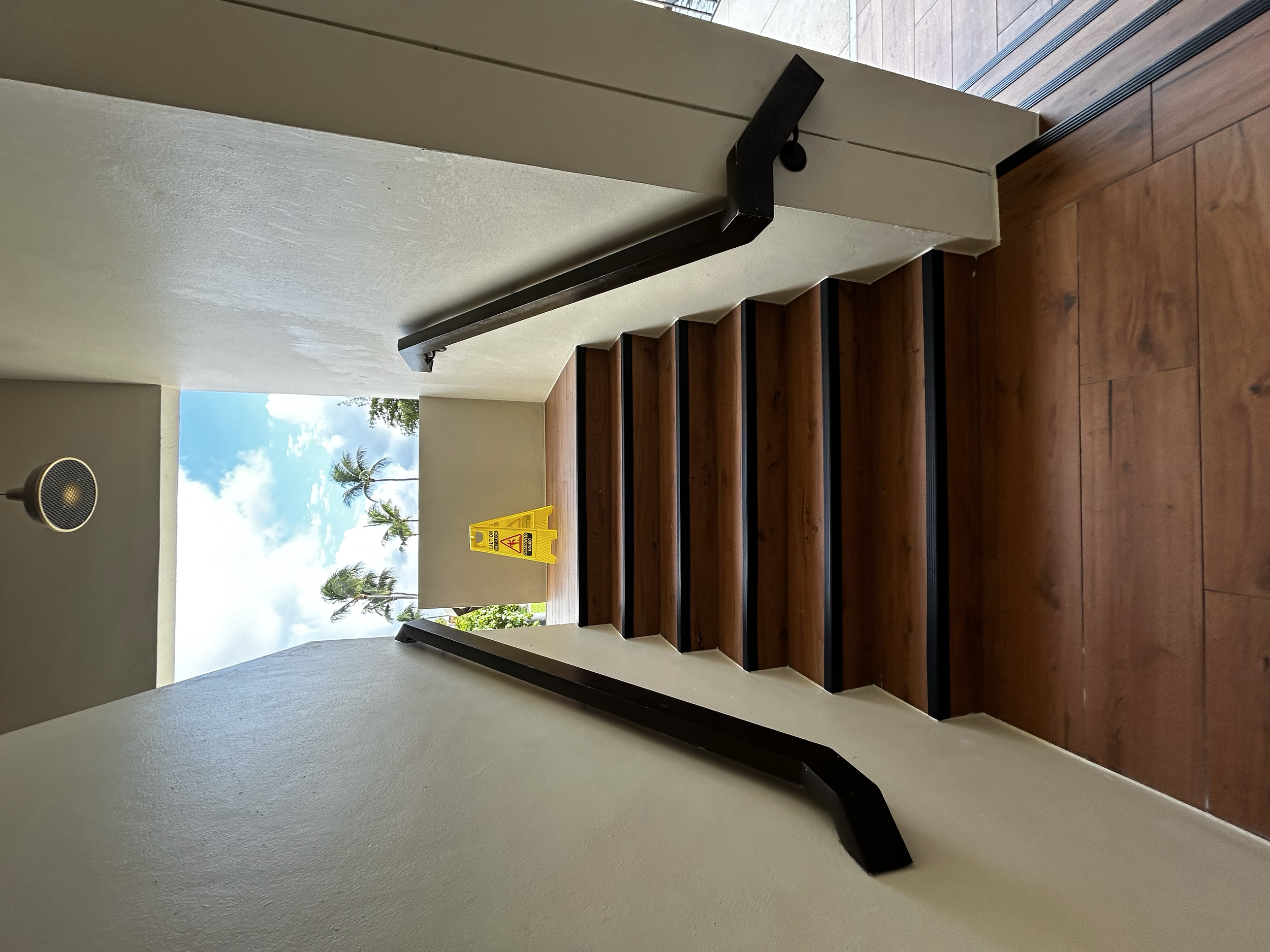 New porcelain tile installed + refurbished hand rails + full paint job in Miami Lakes Hotel