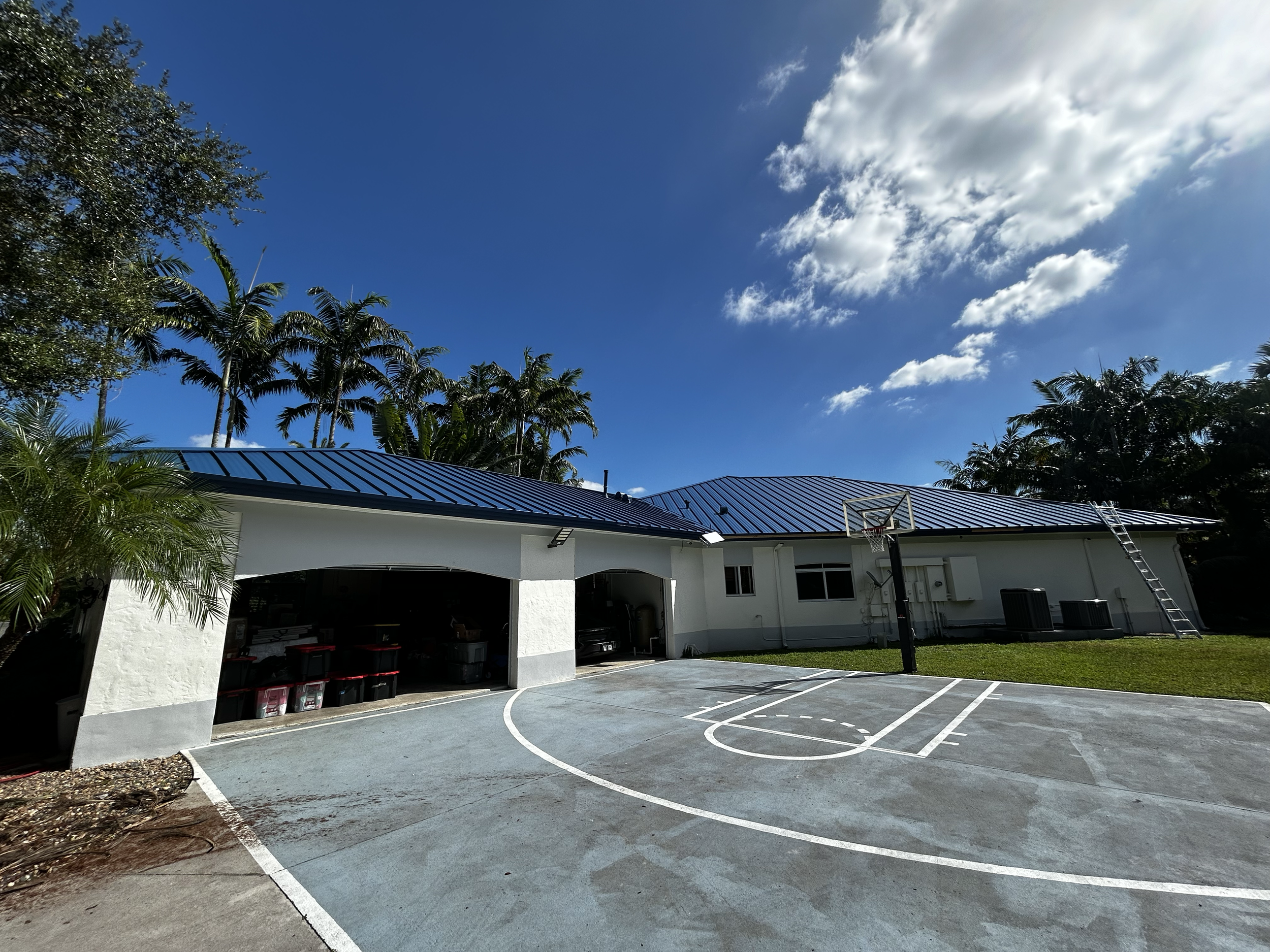 New royal blue metal roof install in South Florida