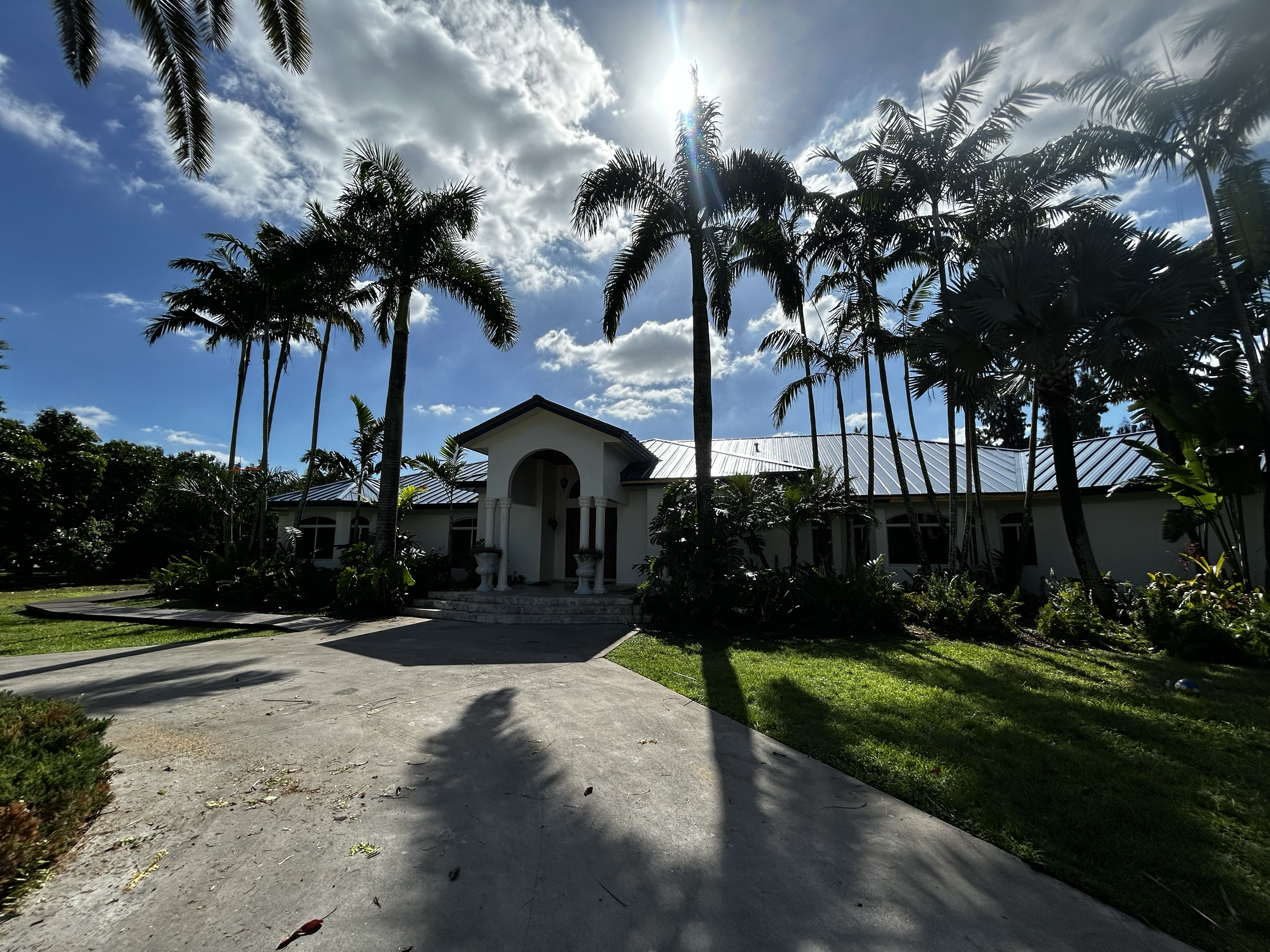 New royal blue metal roof install in South Florida