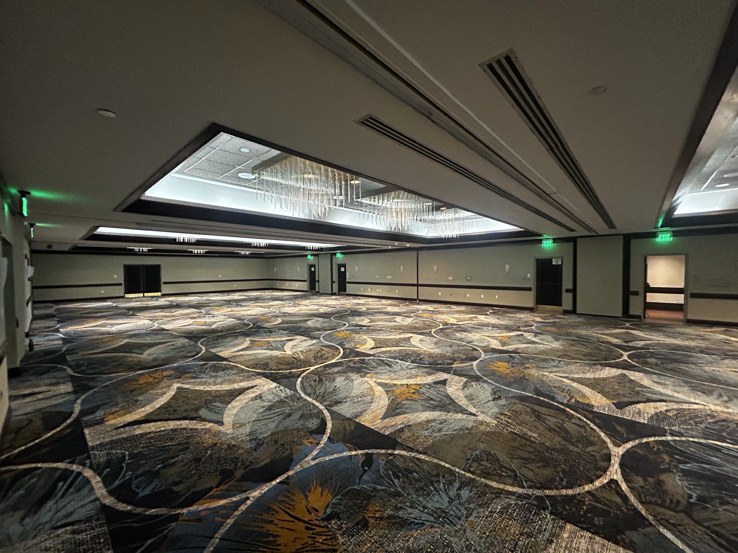 Final result of Miami Lakes Hotel Ballroom; new carpet, new paint job, new wallpaper, and new exit signs