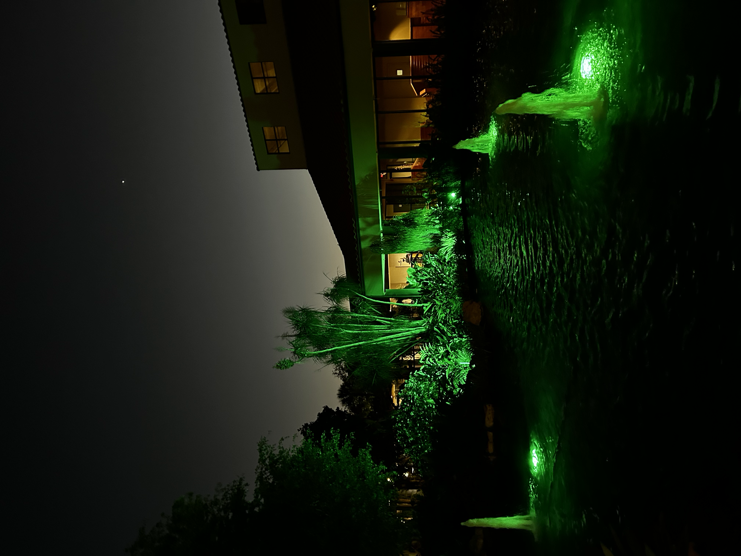 Adjustable LED lights installed inside lagoon and landscaping at Miami Lakes Hotel