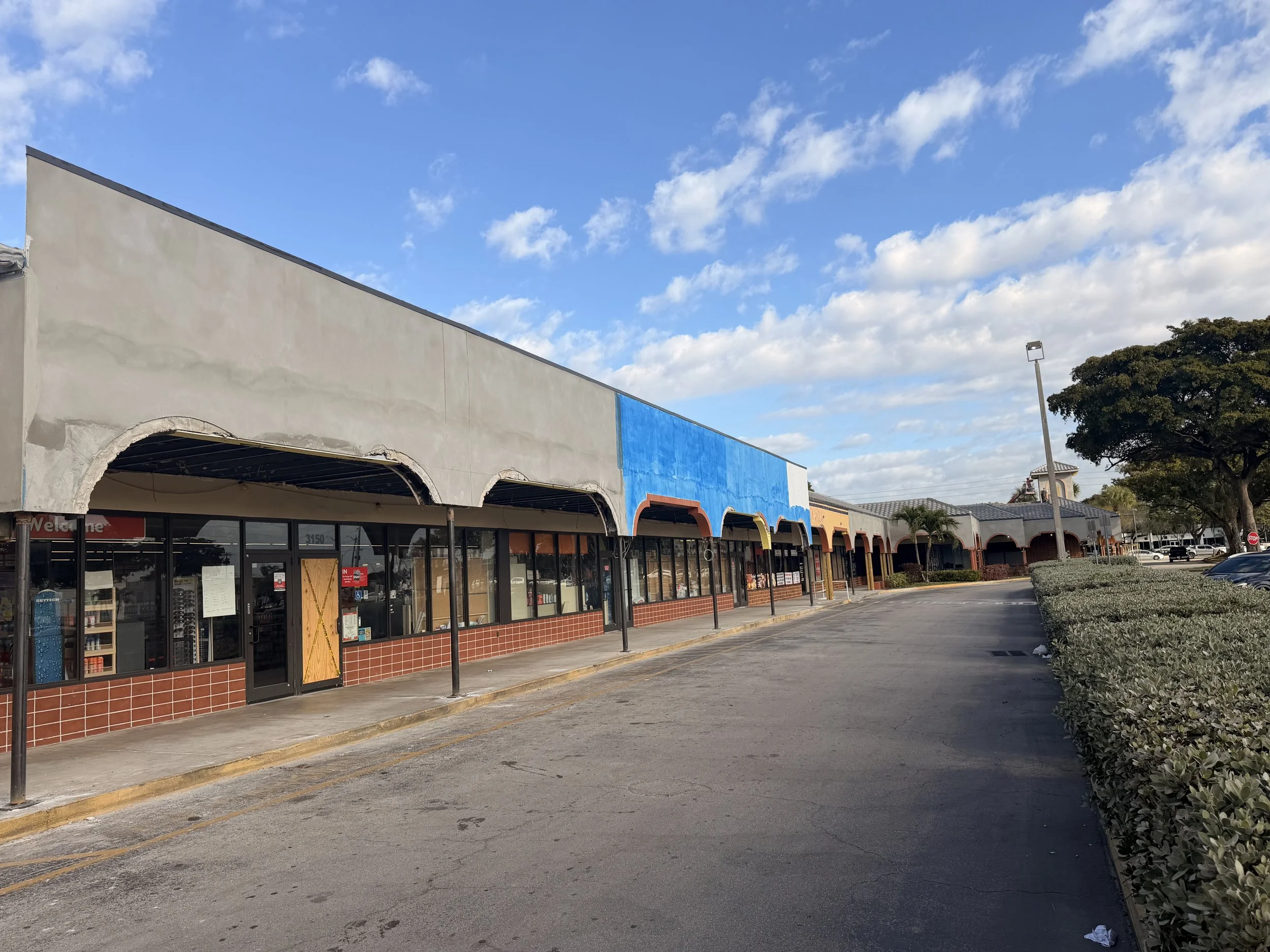 Stucco work in progress in 3 Lakes Shopping Center in Tamarac, Fl