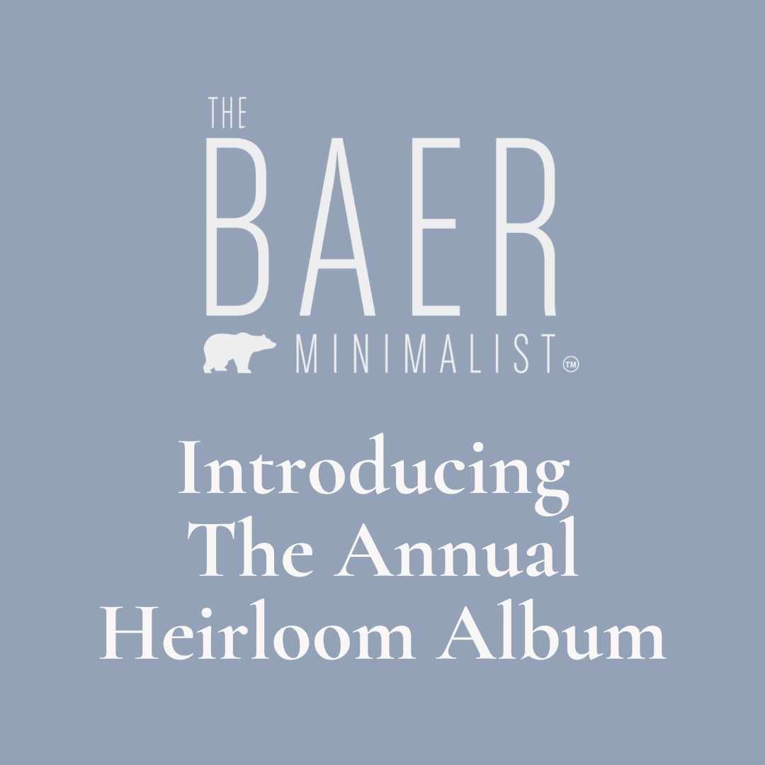 Graphic with text: "The Baer Minimalist blog: Introducing the Annual Heirloom Album" featuring a light blue background, a bear silhouette, and white text.
