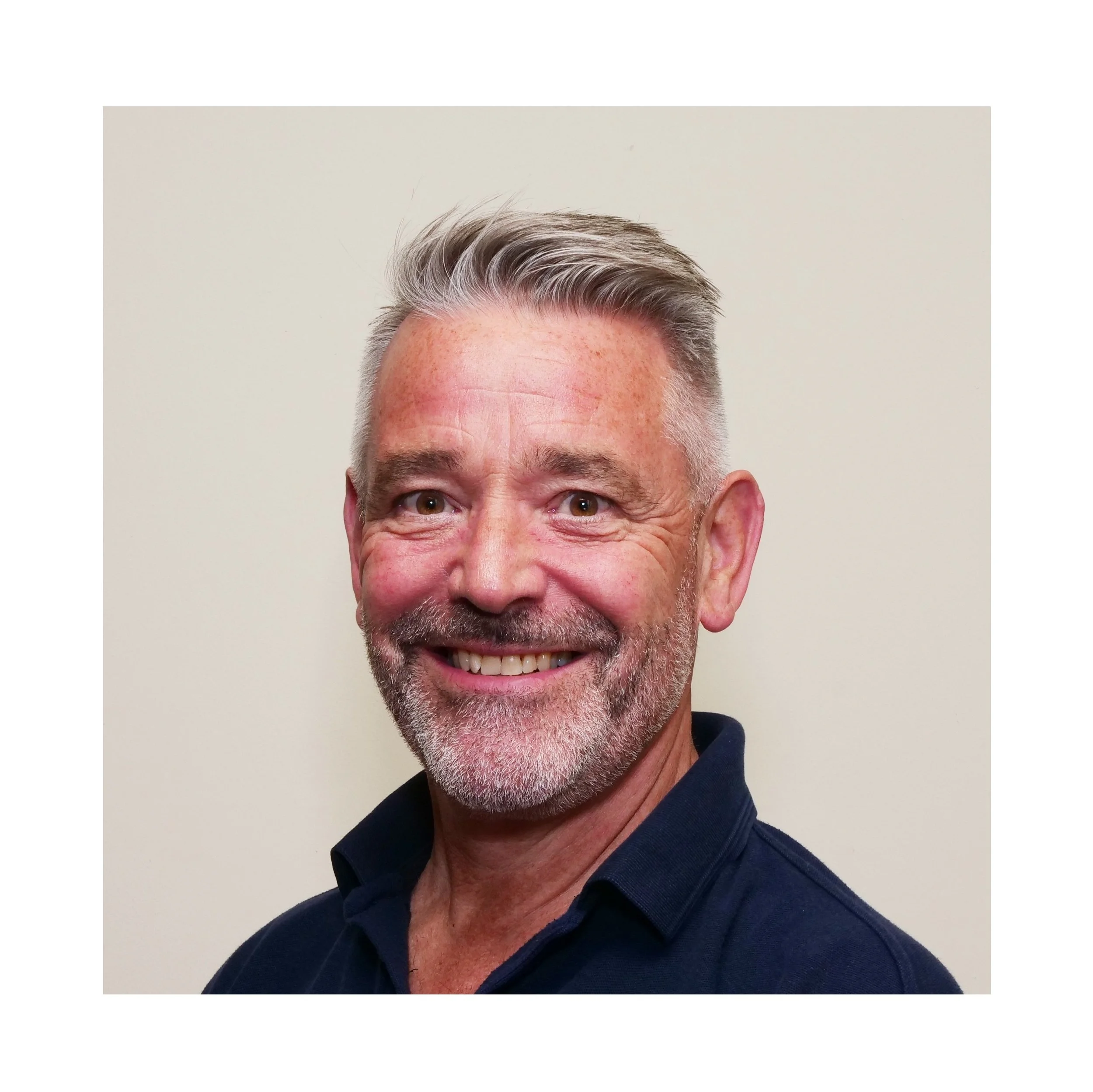 Grey haired man with beard