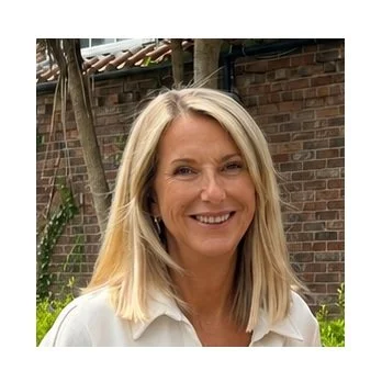Woman with blonde hair smiling