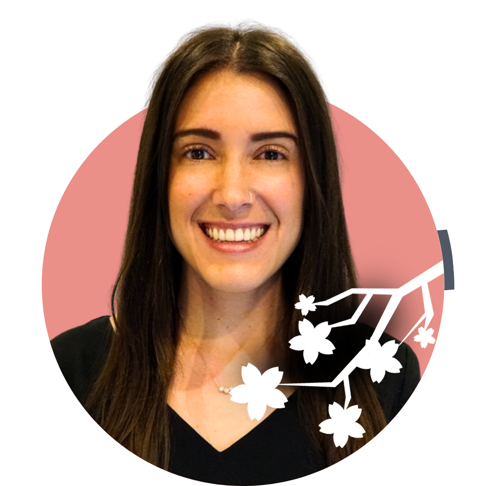 Thumbnail image of Client Care Coordinator Katharine Odlum: A young woman with long dark hair smiling, wearing a black top and a pearl necklace, and a floral graphic overlay near her shoulder.