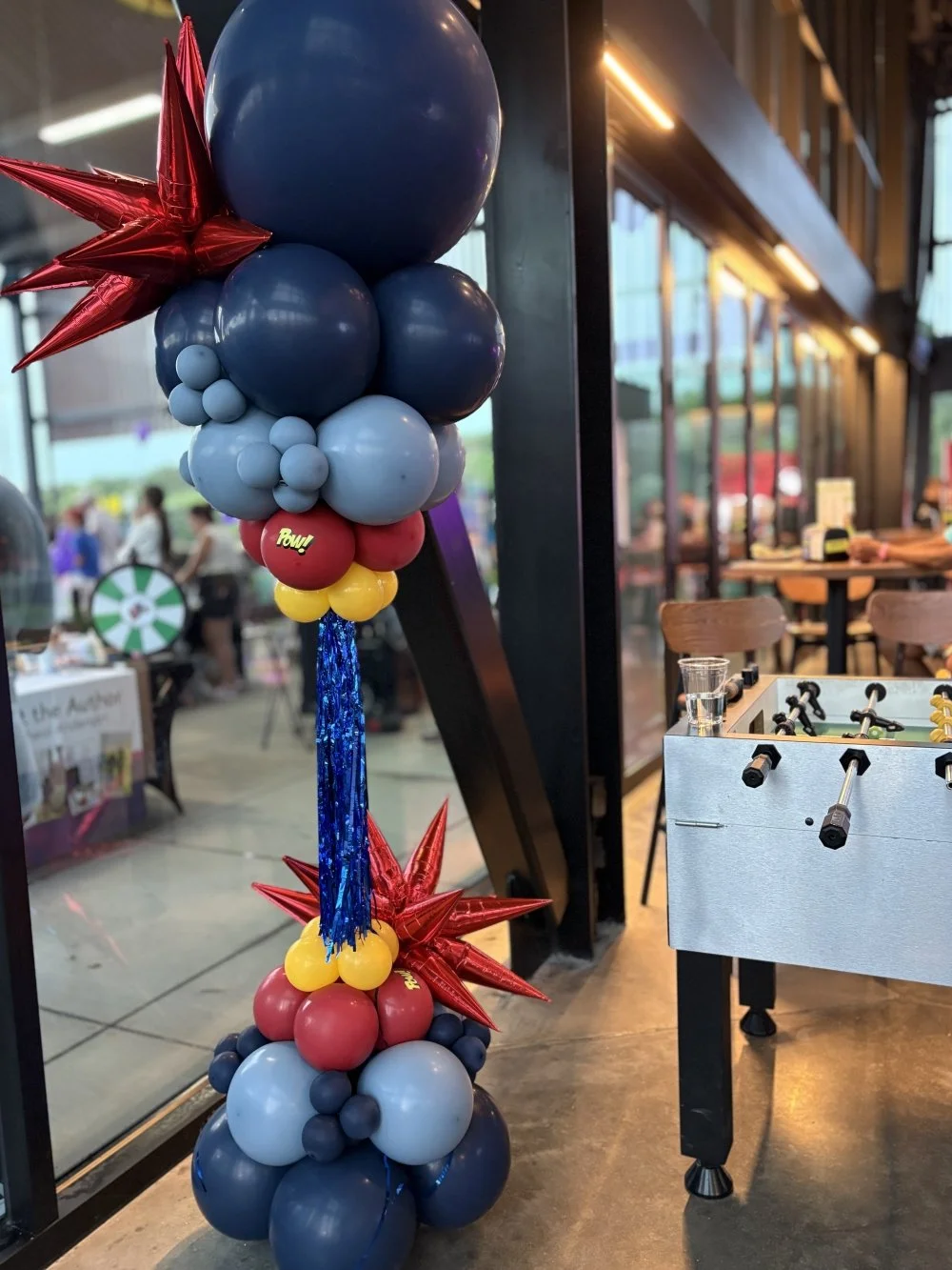 Bash towers with starburst balloons and custom vinyl decals