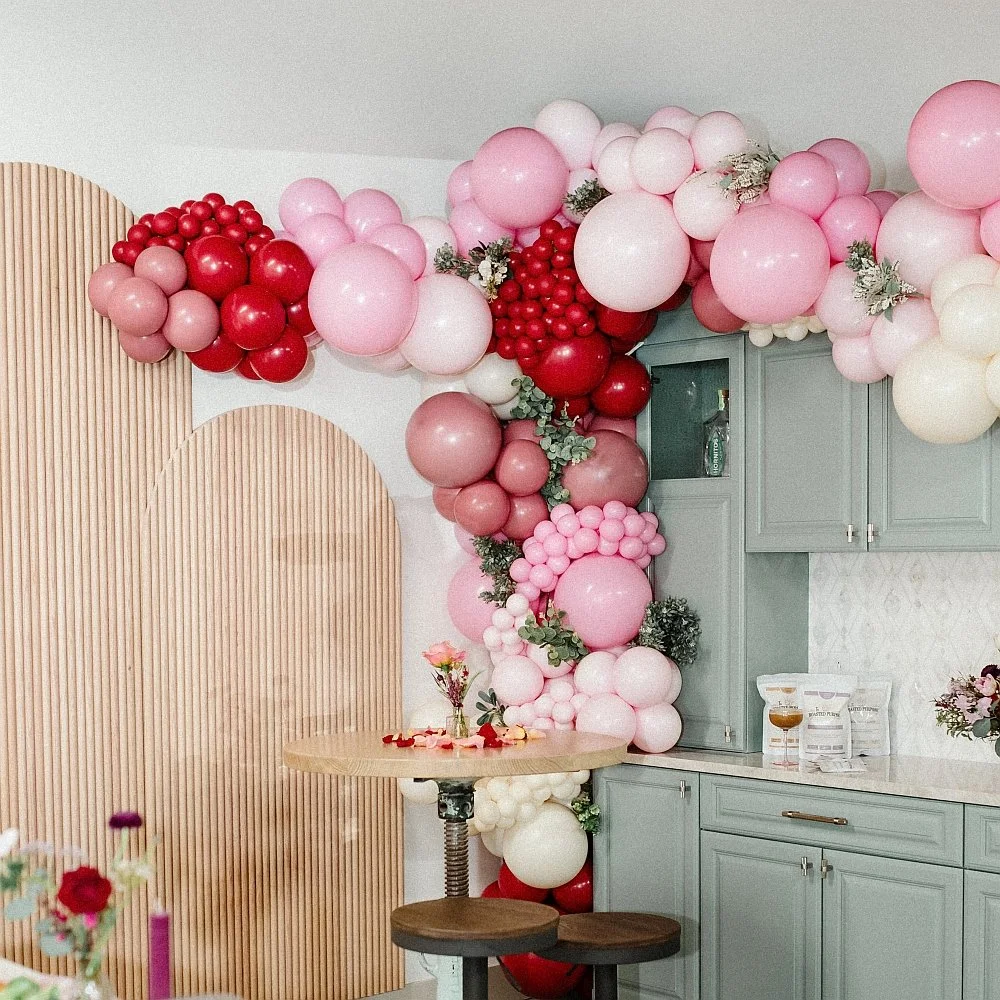 Pink and red organic Valentine's Day balloon garland