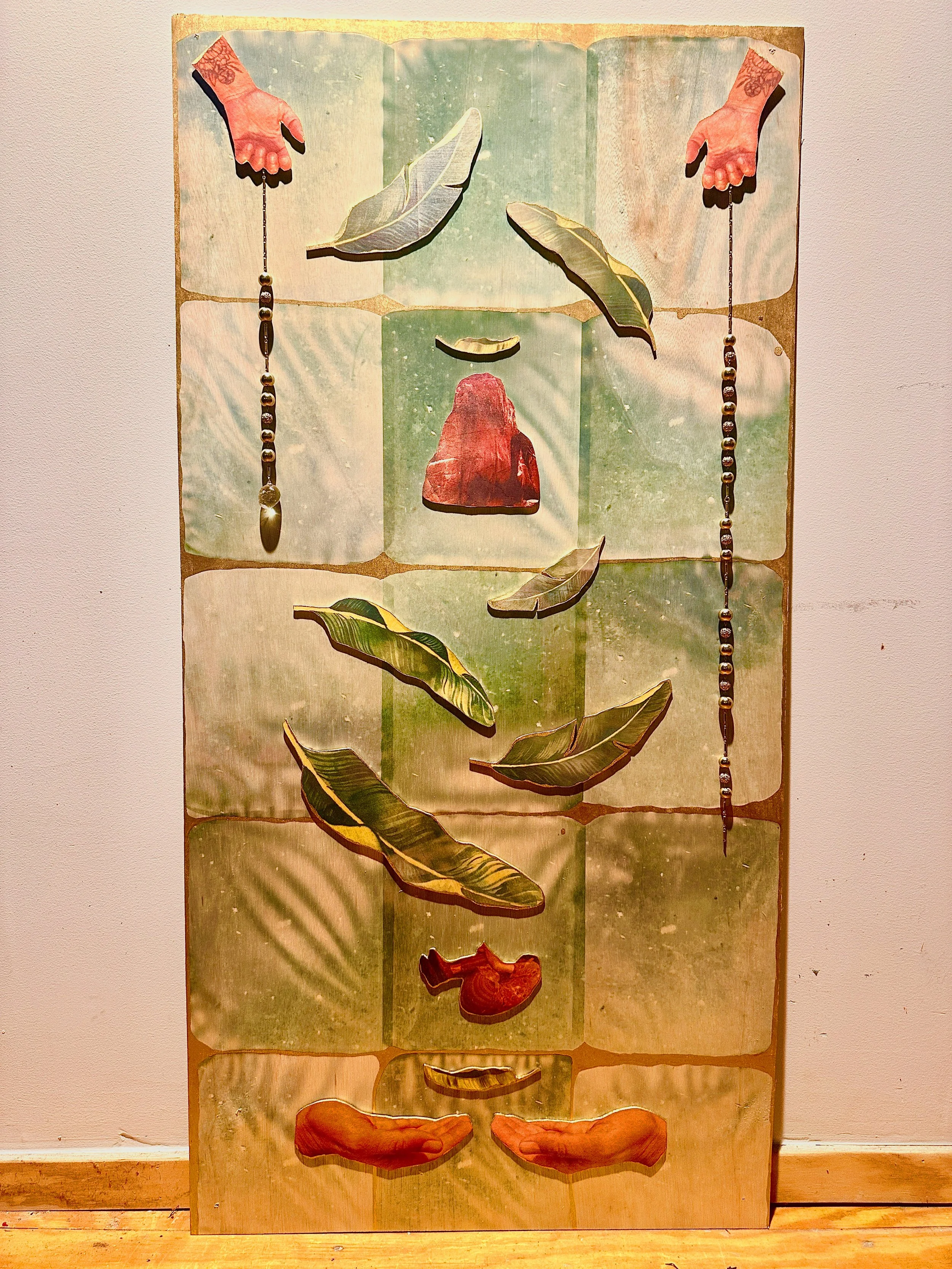 Playa Sector 9- sublimated photographs of the artist onto hand cut wood, gold leaf. Based on the story my dad would tell of sliding on banana leaves at Playa Sector 9 on the edge of El Jagual. The new story ends with him reuniting and resting in the 