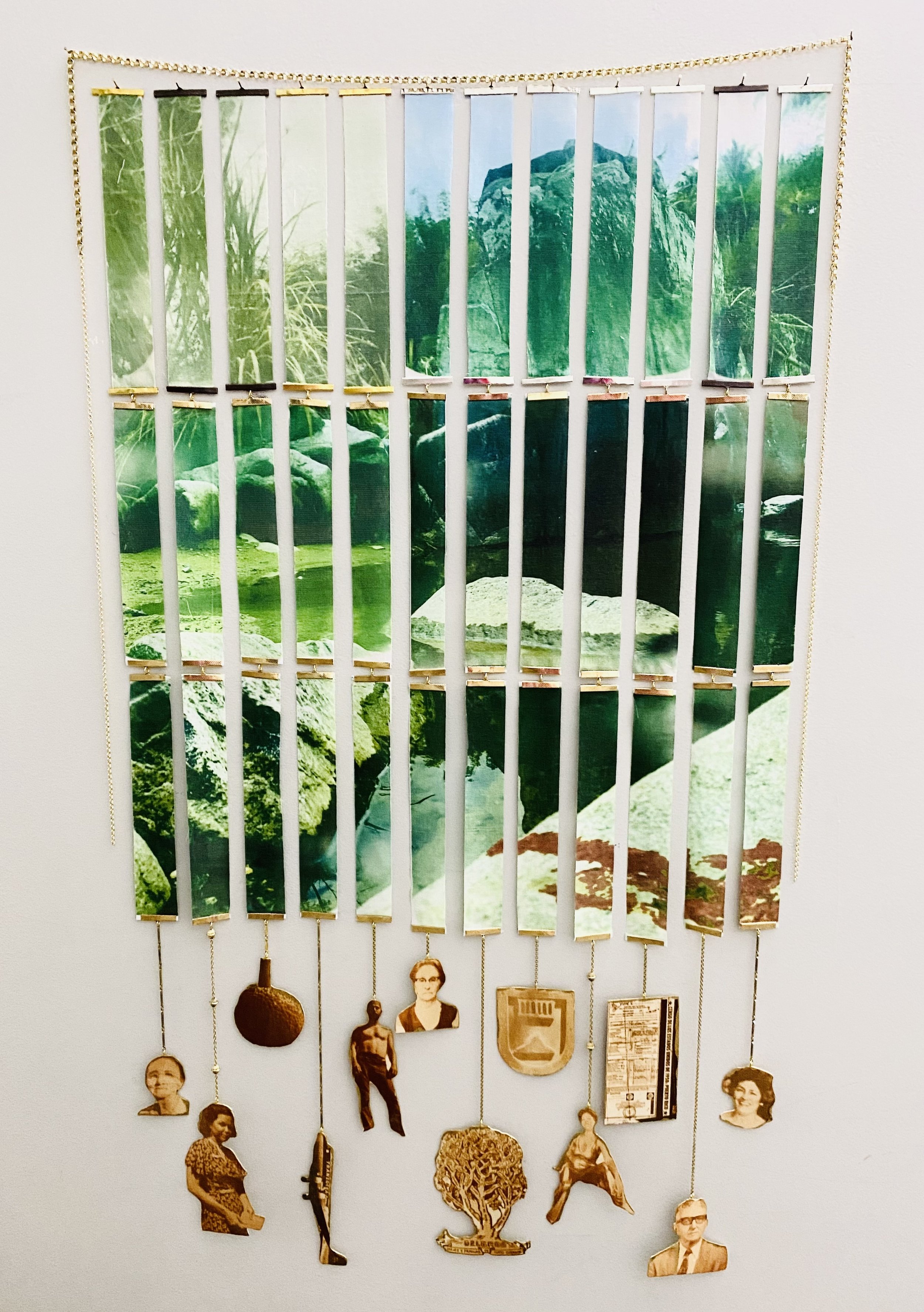 Retazos Ancestrales- the title piece directing the creation of the body of work. Photograph sublimated on fabric, cut and reassembled. Hanging from the fabric are archival photos sublimated on hand cut wood with gold leaf.