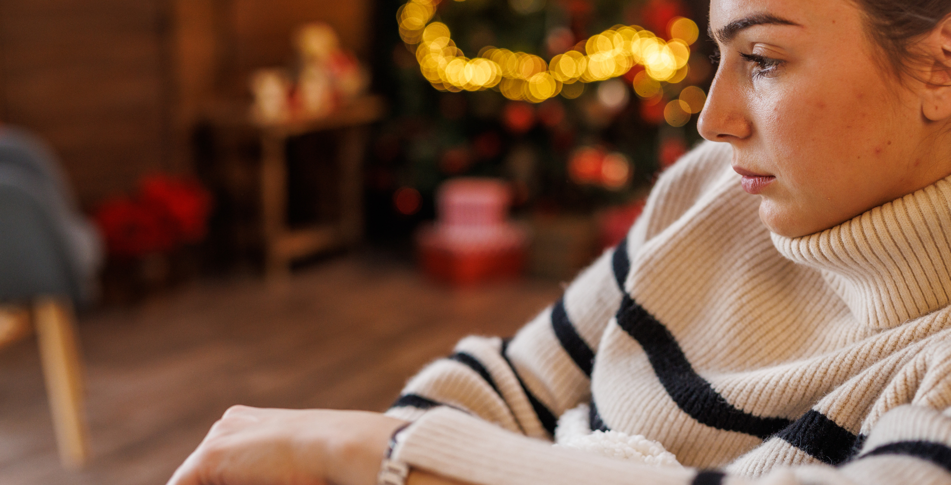 A woman who is sad during the holiday season