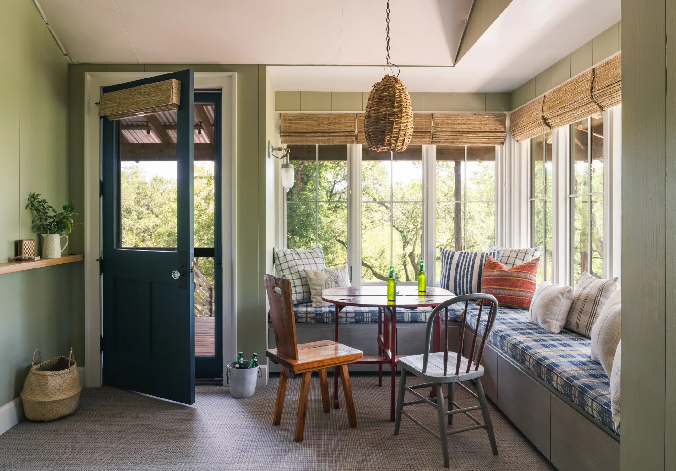 Restored 1800s homesteader cabin games nook with patterned fabric, Ranchita Hill Country ranch