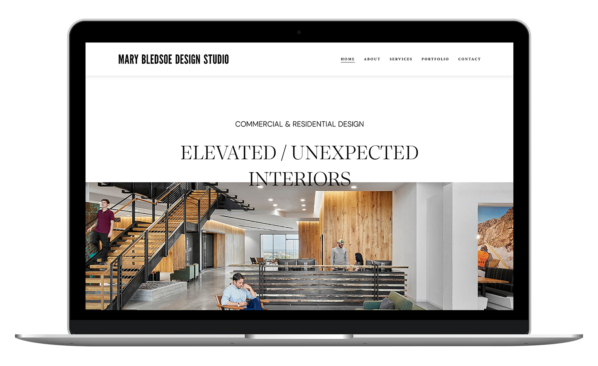 Laptop display showing Mary Bledsoe Design Studio's website, highlighting commercial and residential interior design with modern office interior visuals.