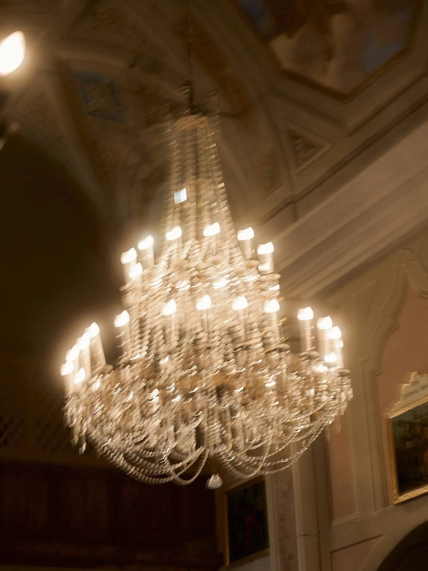 Just a chandelier. I needed an image that could works with the others, creating balance and ecc ecc...just a church chandelier.
That's it,
But it was took during a wedding so is still a wedding picture.

#church #wedding #italyweddingphotographer