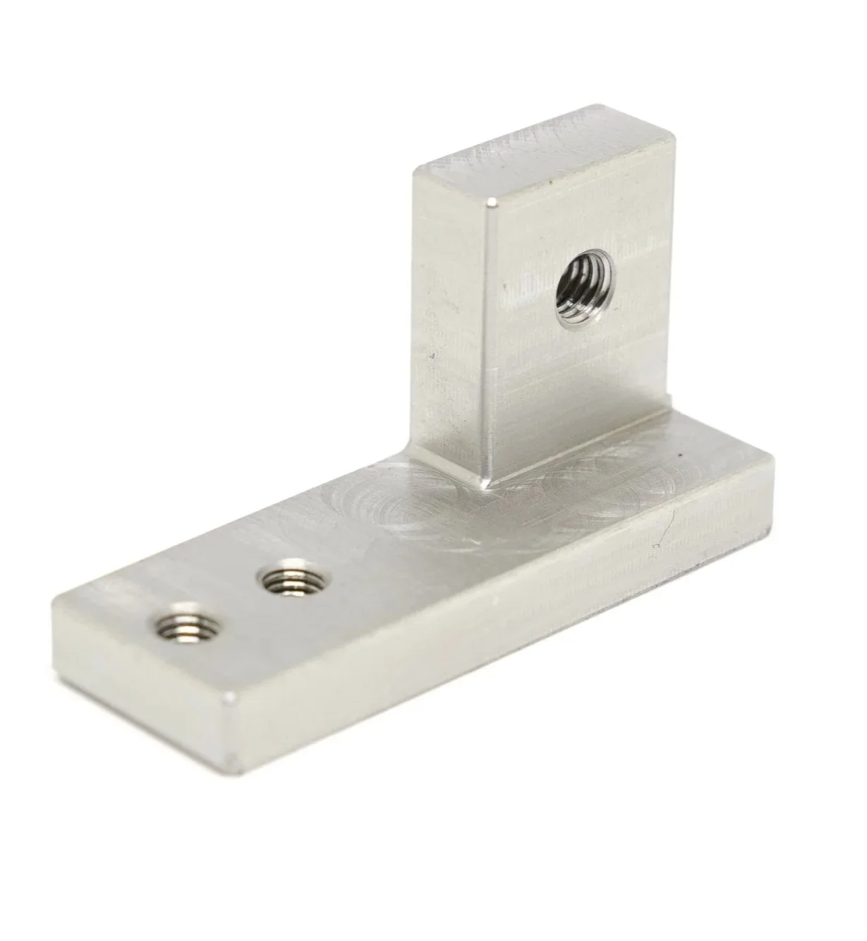 A silver metallic L-shaped bracket with three screw holes, two on the base and one on the vertical piece, with visible threading inside the holes.