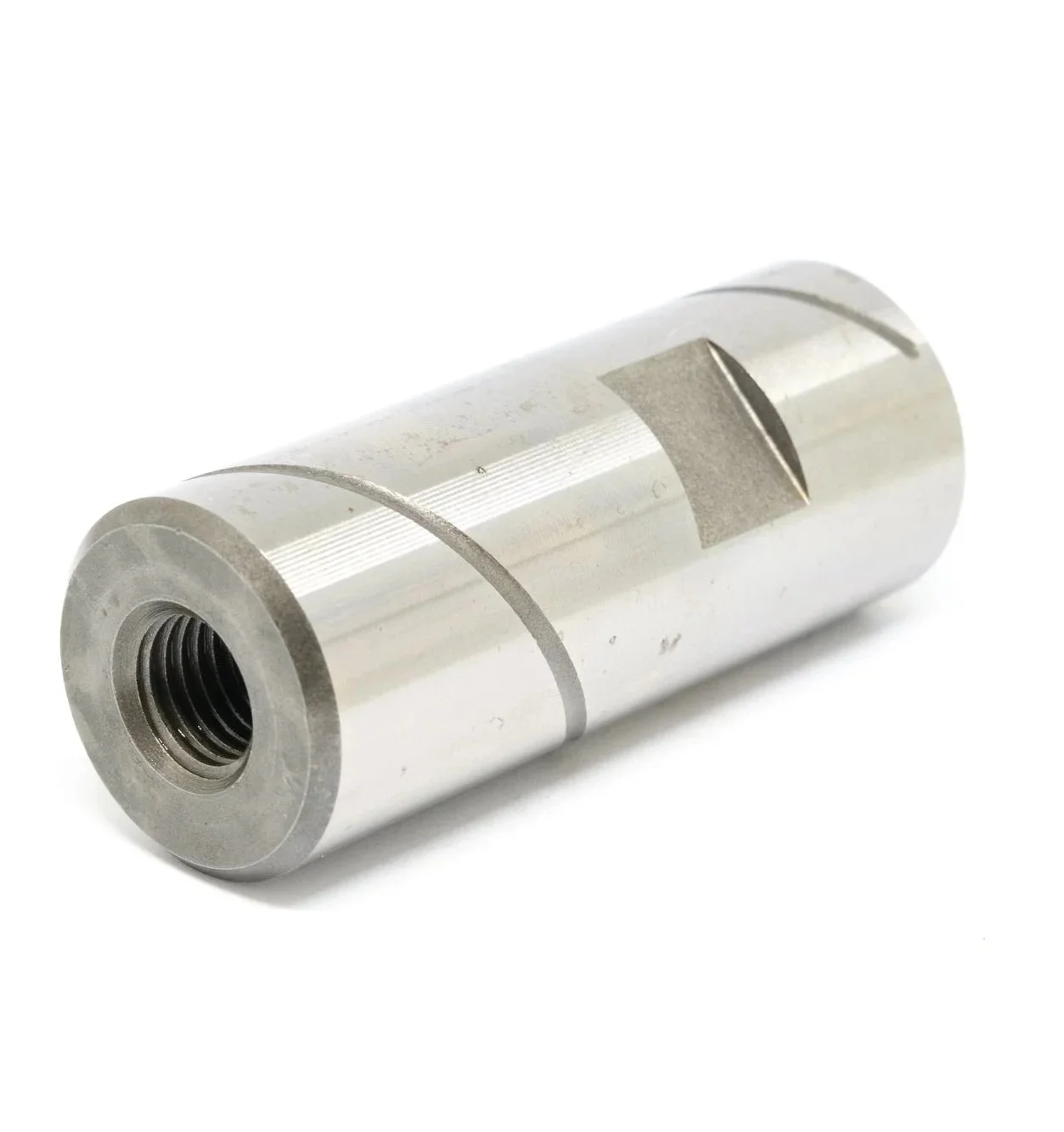 Metal cylinder with threaded hole at one end and a rectangular slot along the side.
