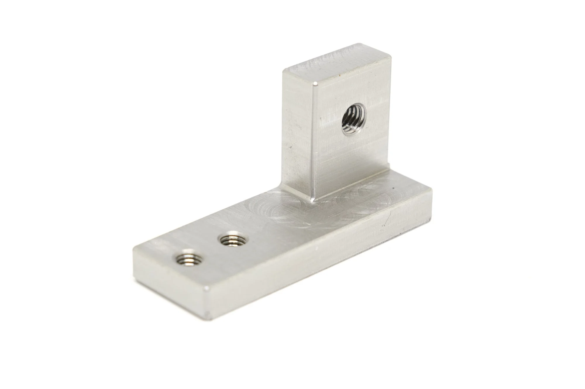 Metallic right-angle bracket with three threaded holes, isolated on white background.