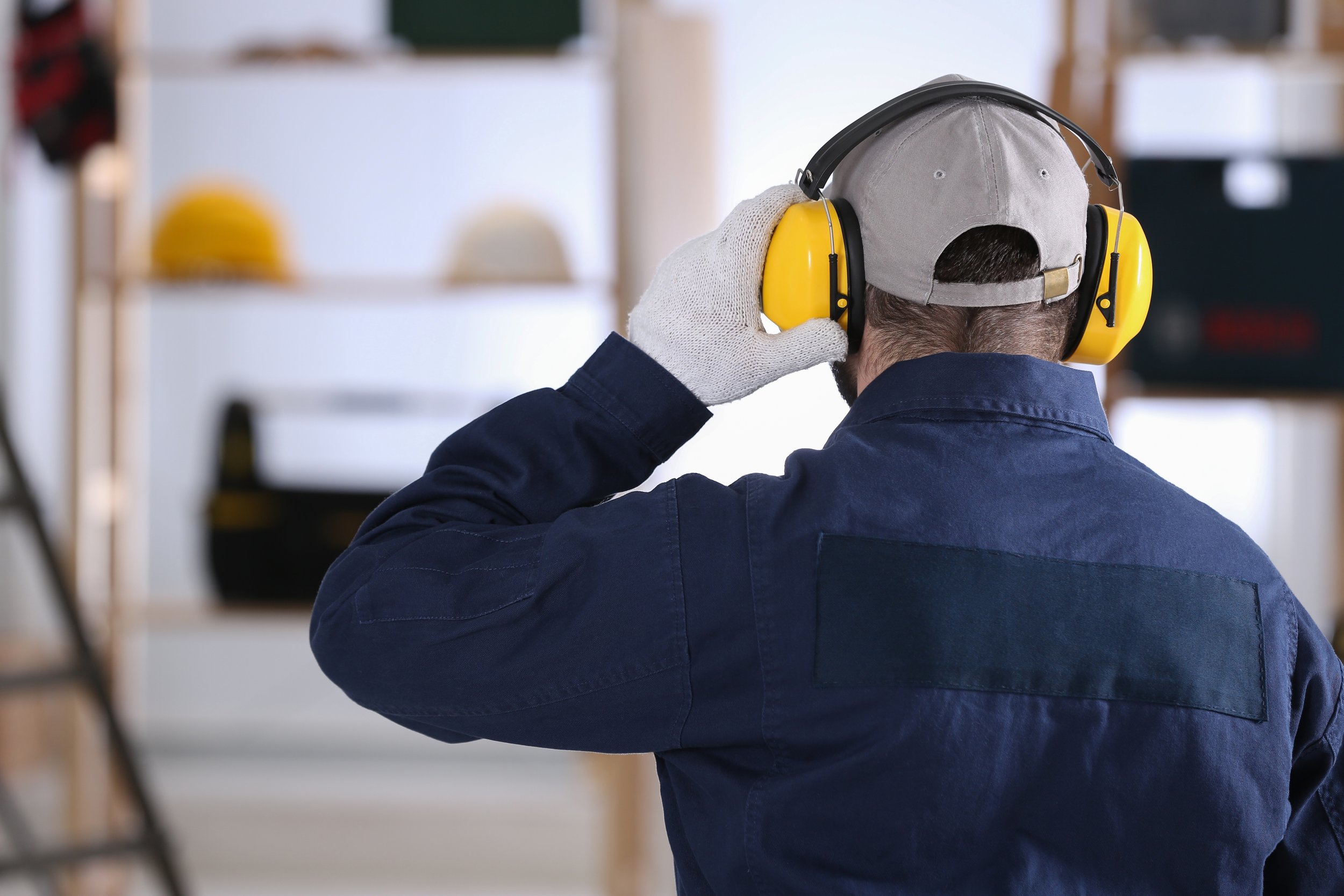 Man with hearing protection recommended by mobile audio test