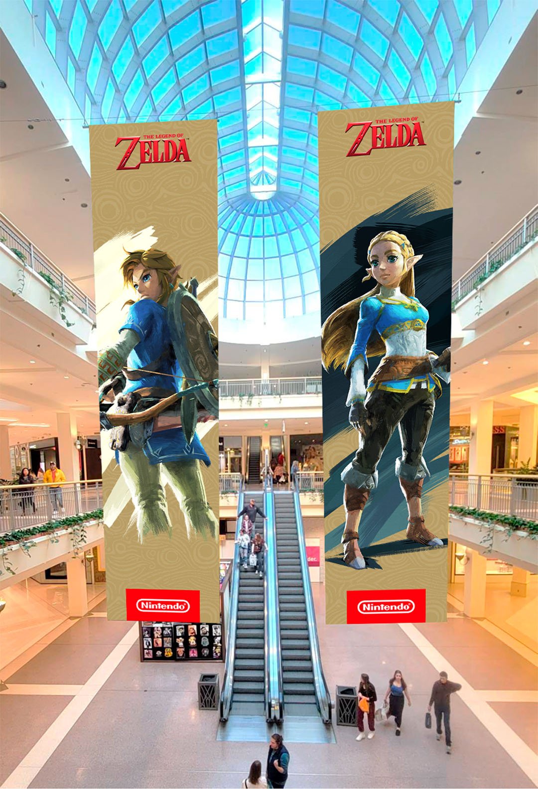 Two large banners hanging in a shopping mall featuring characters from the video game "The Legend of Zelda". The left banner shows Link, the hero, holding a bow and sword, while the right banner shows Princess Zelda. Both banners display the Nintendo logo at the bottom.