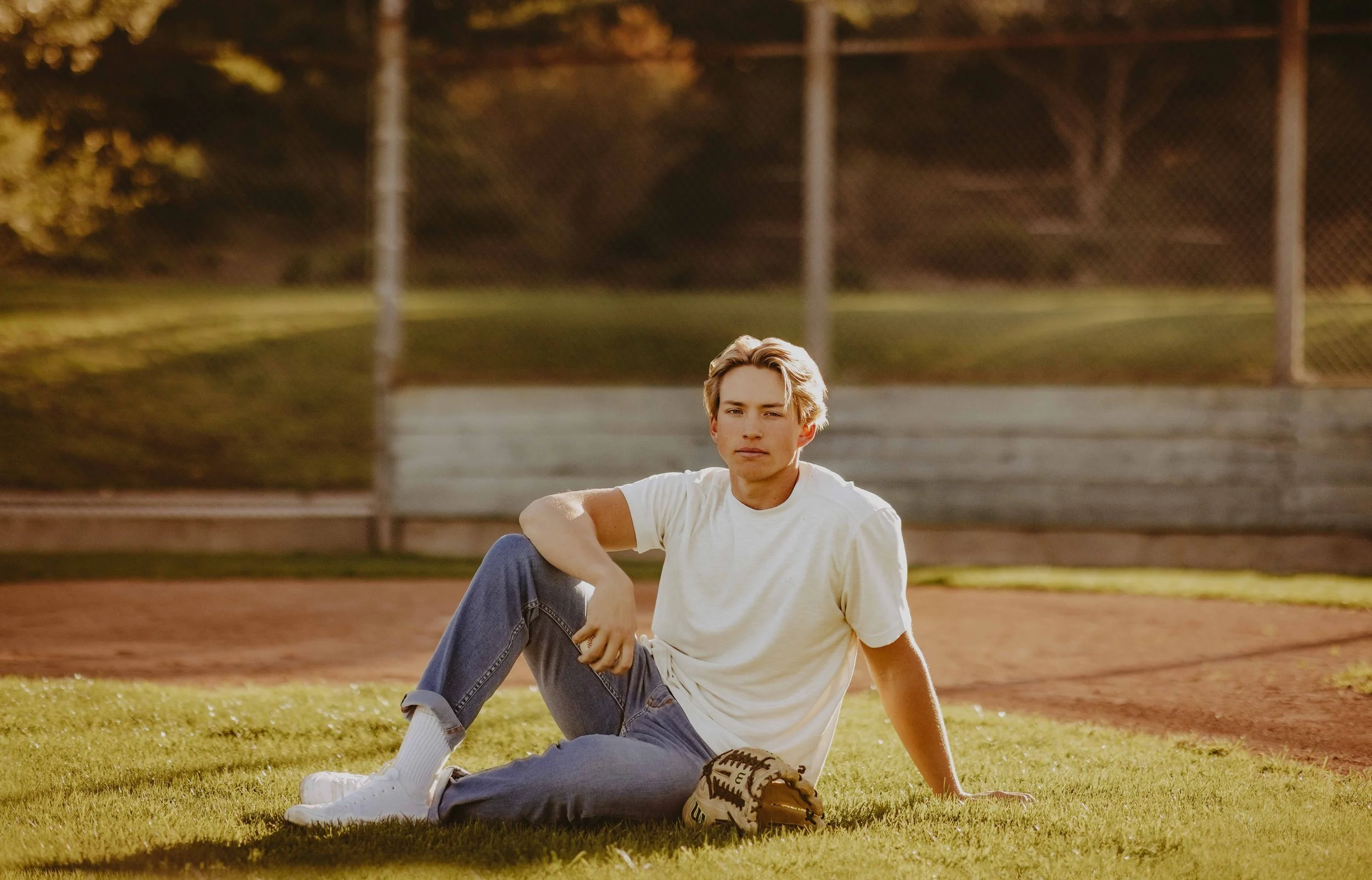  baseball senior boy poses 